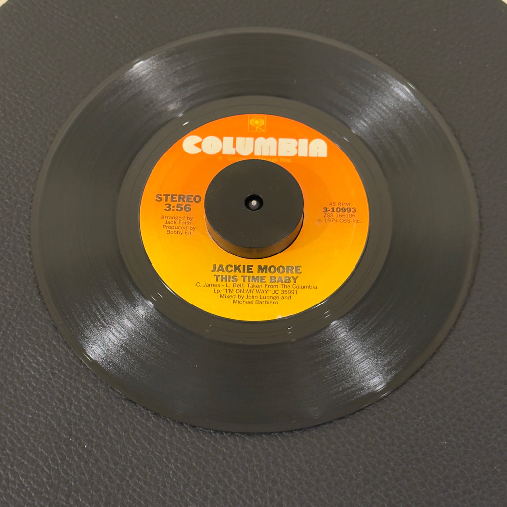 7" vinyl record by Jackie Moore featuring "This TIme Baby/Let's Go Somewhere And Make Love", released on Columbia (3-10993), in VG+ (Very Good Plus) condition, classic analog collectable for turntable playback. Includes original Columbia sleeve.