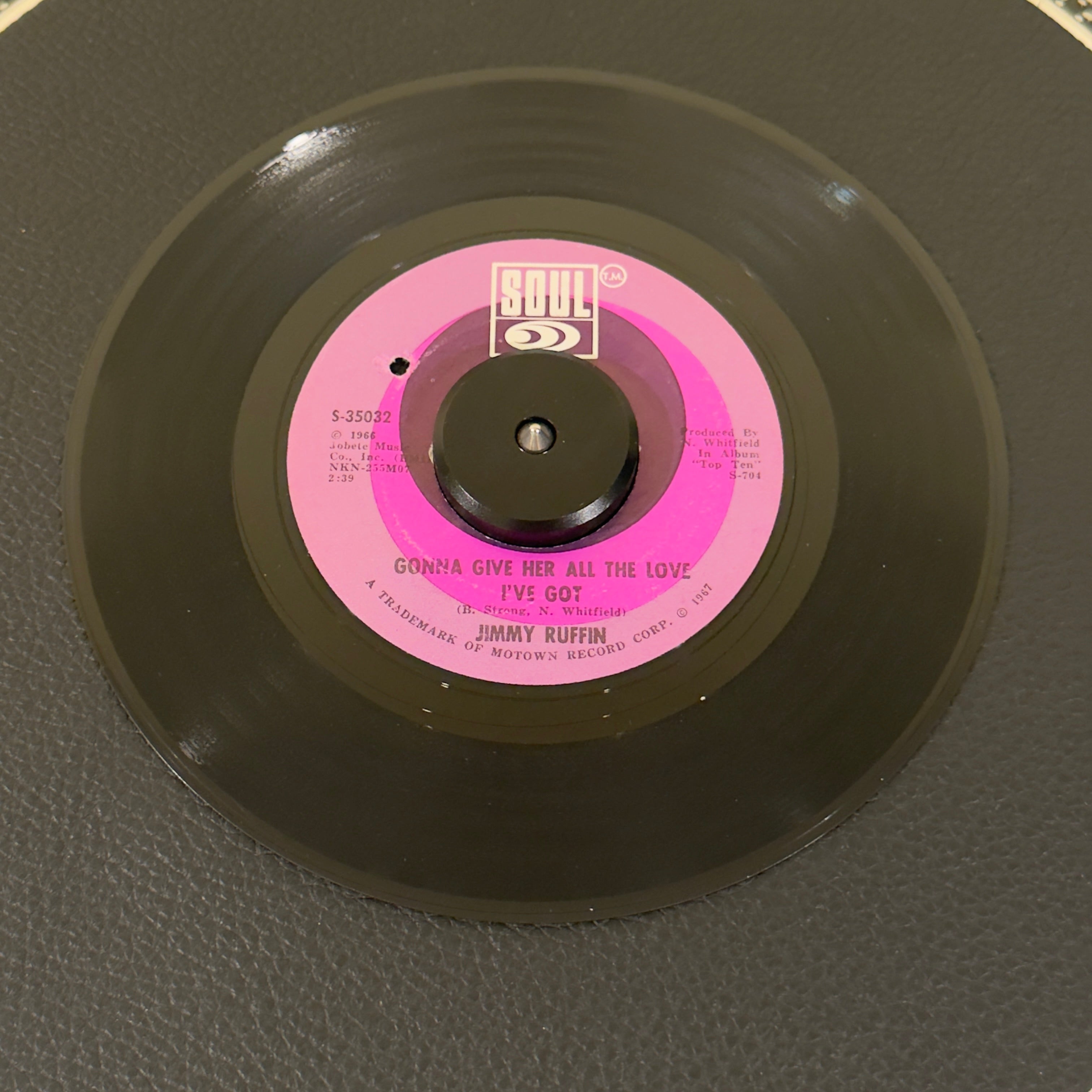 7" vinyl record by Jimmy Ruffin featuring "Gonna Give Her All The Love I've Got/World So Wide, Nowhere To Hide (From Your Heart)", released on Soul (S-35032), in VG+ (Very Good Plus) condition, classic analog collectable for turntable playback. Masterclass in heartbroken, mid-tempo Motown soul.  Label has a BB hole.