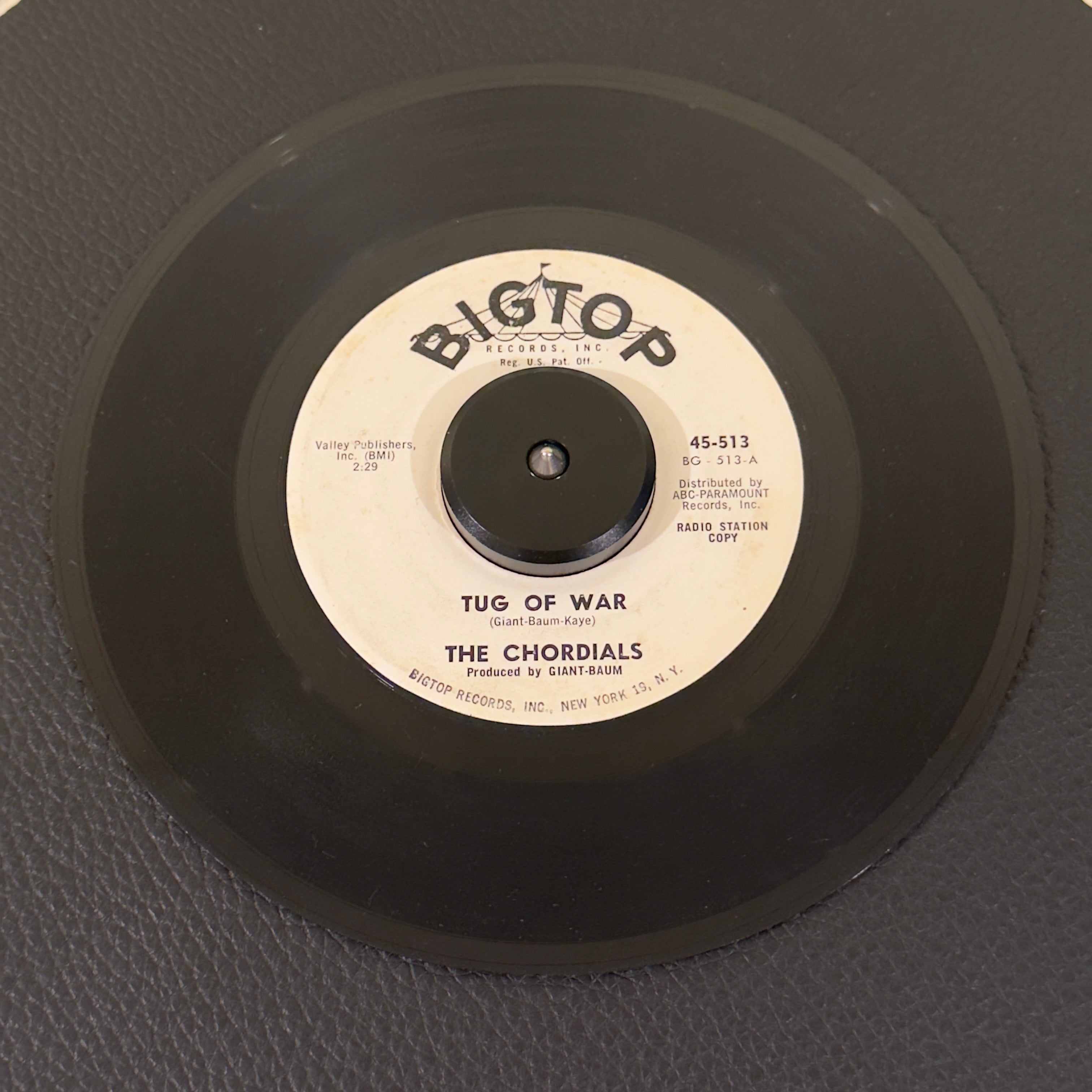 7" vinyl record by Chordials, The featuring "Tug Of War/I Wish It Were Summer", released on Bigtop (45-513), in G+ (Good Plus) condition, classic analog collectable for turntable playback. Rare slice of 1964 vocal harmony in an original Bigtop sleeve!  Promotional Copy!