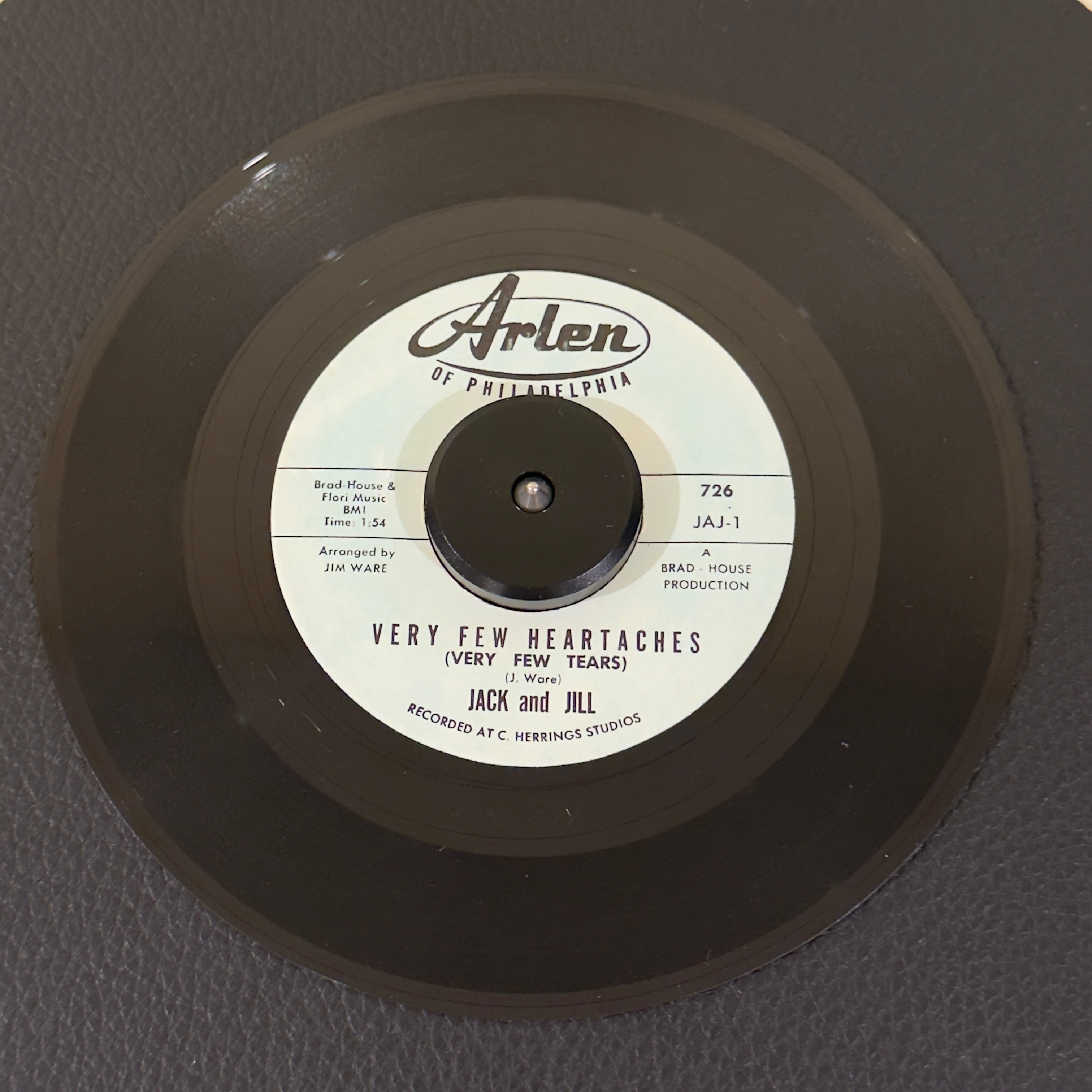 7" vinyl record by Jack and Jill featuring "Very Few Heartaches (Very Few Tears)/Lauries' Love", released on Arlen (726), in VG+ (Very Good Plus) condition, classic analog collectable for turntable playback. Beautiful copy of the obscure teen doo-wop gem.