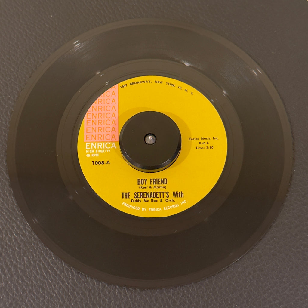 7" vinyl record by Serenadett's - With Teddy Mc Rae & Orch. featuring "Boy Friend/The Big Night", released on Enrica (1008), in NM (Near Mint) condition, classic analog collectable for turntable playback. Unbelievably well-preserved, archive-quality original 1961 pressing of an incredibly obscure New York vocal harmony record!