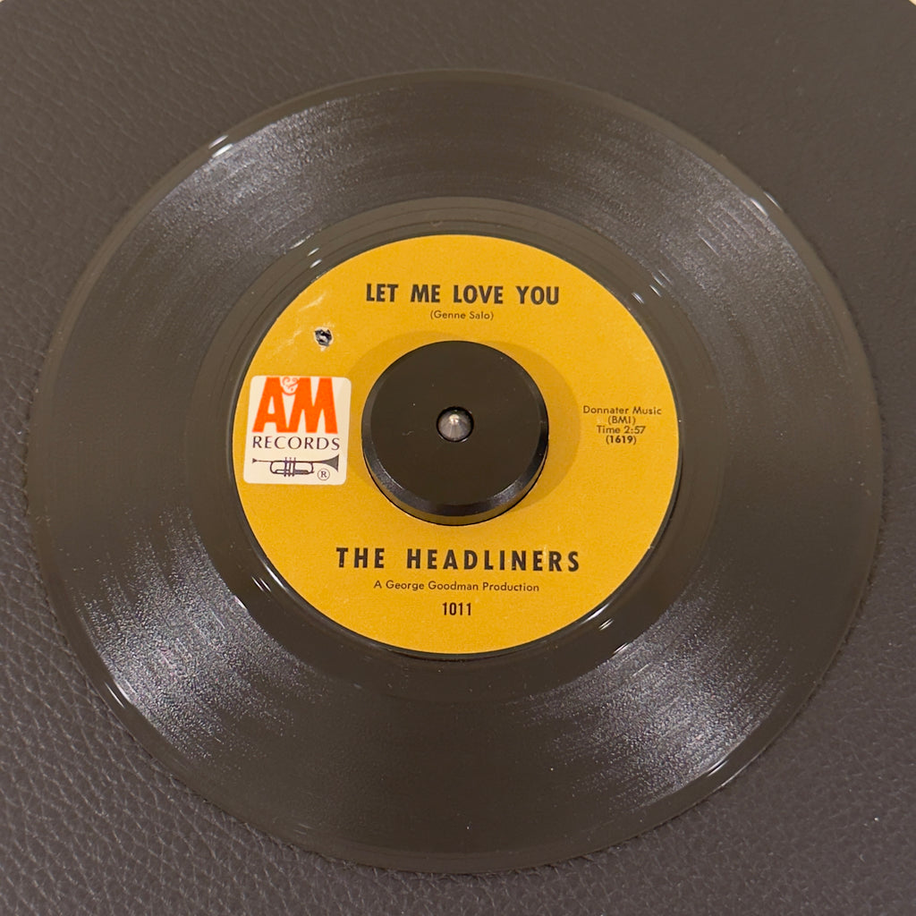 7" vinyl record by Headliners, The featuring "Let Me Love You/I'm So Tired", released on A&M Records (1011), in NM (Near Mint) condition, classic analog collectable for turntable playback. 1969 Reissue in original A&M sleeve.