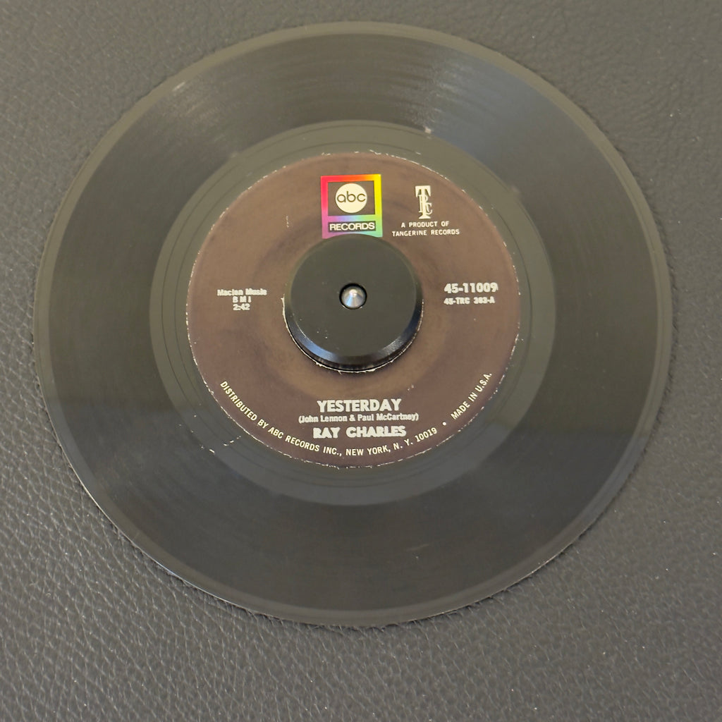 7" vinyl record by Ray Charles featuring "Yesterday/Never Had Enough Of Nothing Yet", released on ABC Records (45-11009), in VG+ (Very Good Plus) condition, classic analog collectable for turntable playback. Ray Charles delivering his masterful, soulful rendition of The Beatles' classic "Yesterday". Original ABC sleeve.