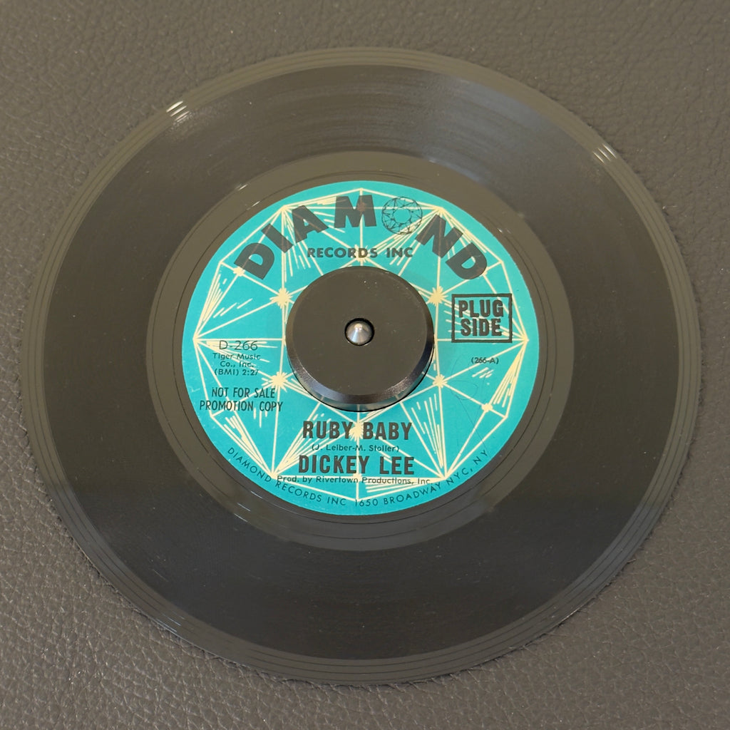 7" vinyl record by Dickey Lee featuring "Ruby Baby/I Remember Barbara", released on Diamond Records (D-266), in VG+ (Very Good Plus) condition, classic analog collectable for turntable playback. Rare Diamond Records promo copy!