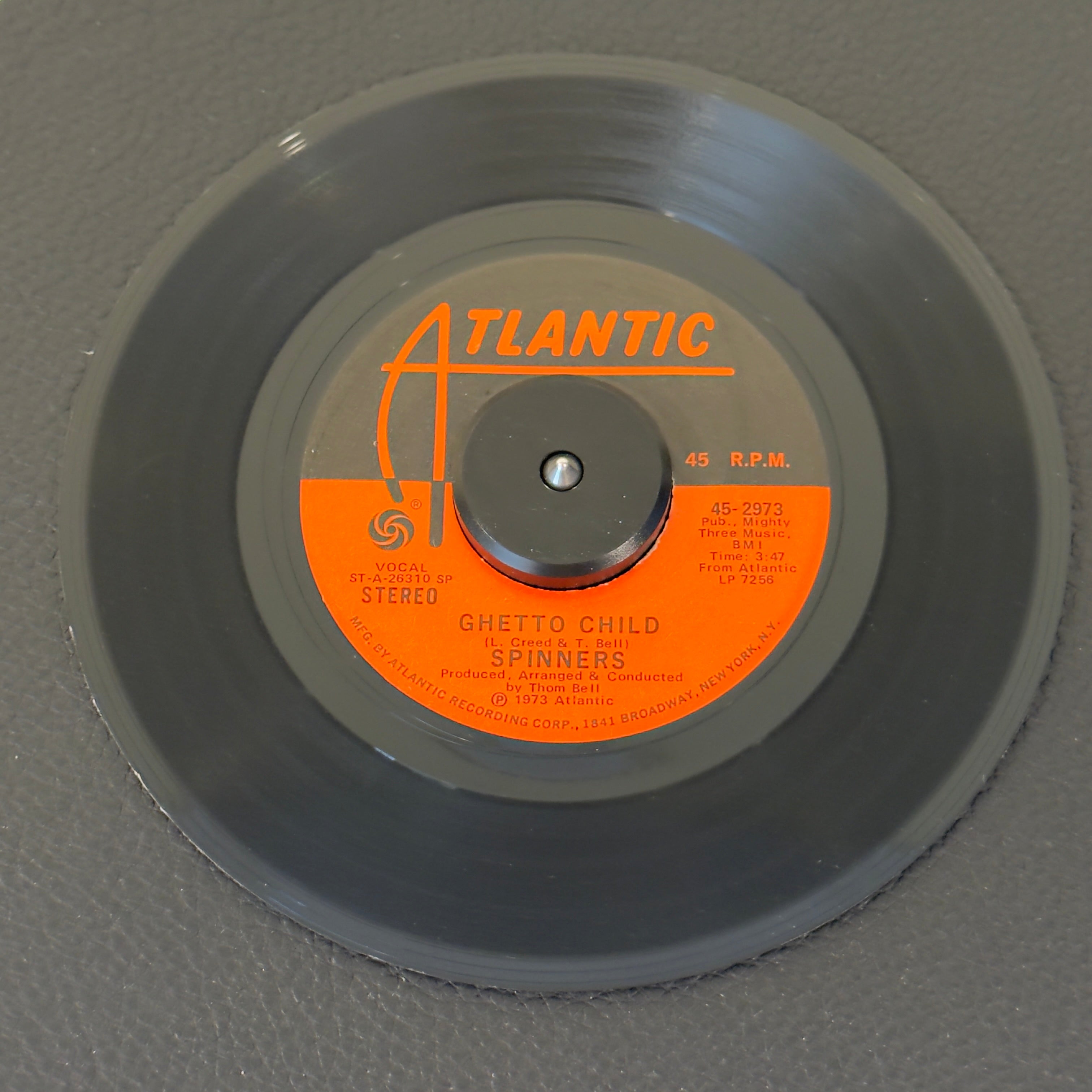 7" vinyl record by Spinners featuring "Ghetto Child/We Belong Together", released on Atlantic (45-2973), in VG+ (Very Good Plus) condition, classic analog collectable for turntable playback. Includes original Atlantic sleeve.