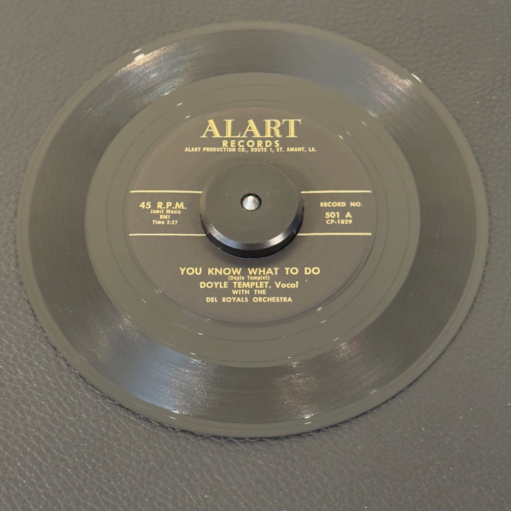 7" vinyl record by Doyle Templet featuring "You Know What To Do/Waiting All Alone", released on Alart Records (501), in VG+ (Very Good Plus) condition, classic analog collectable for turntable playback. Textbook example of early raw swamp-rock and rock & roll, combining driving percussion with Templet’s sharp vocal delivery.