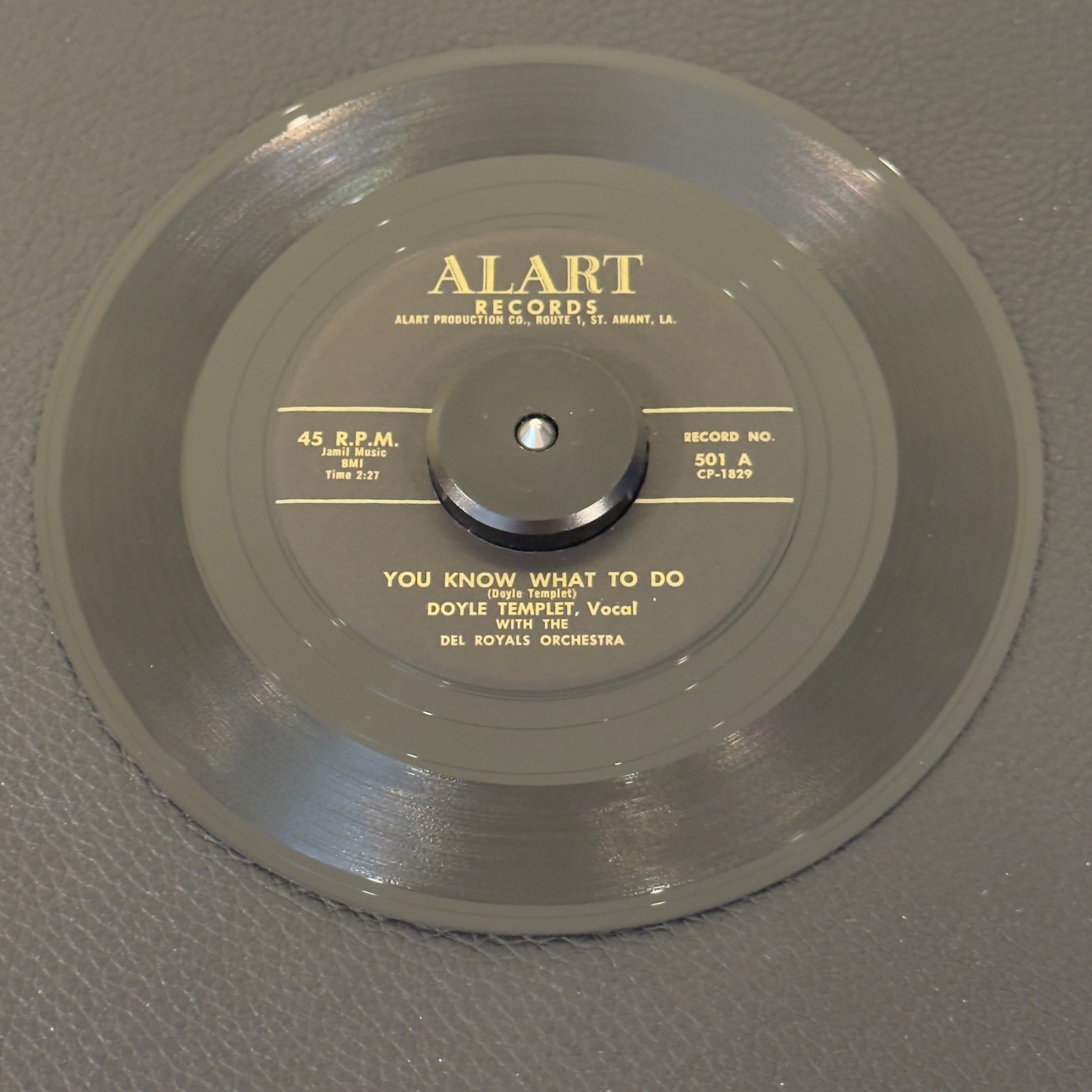 7" vinyl record by Doyle Templet featuring "You Know What To Do/Waiting All Alone", released on Alart Records (501), in VG+ (Very Good Plus) condition, classic analog collectable for turntable playback. Textbook example of early raw swamp-rock and rock & roll, combining driving percussion with Templet’s sharp vocal delivery.