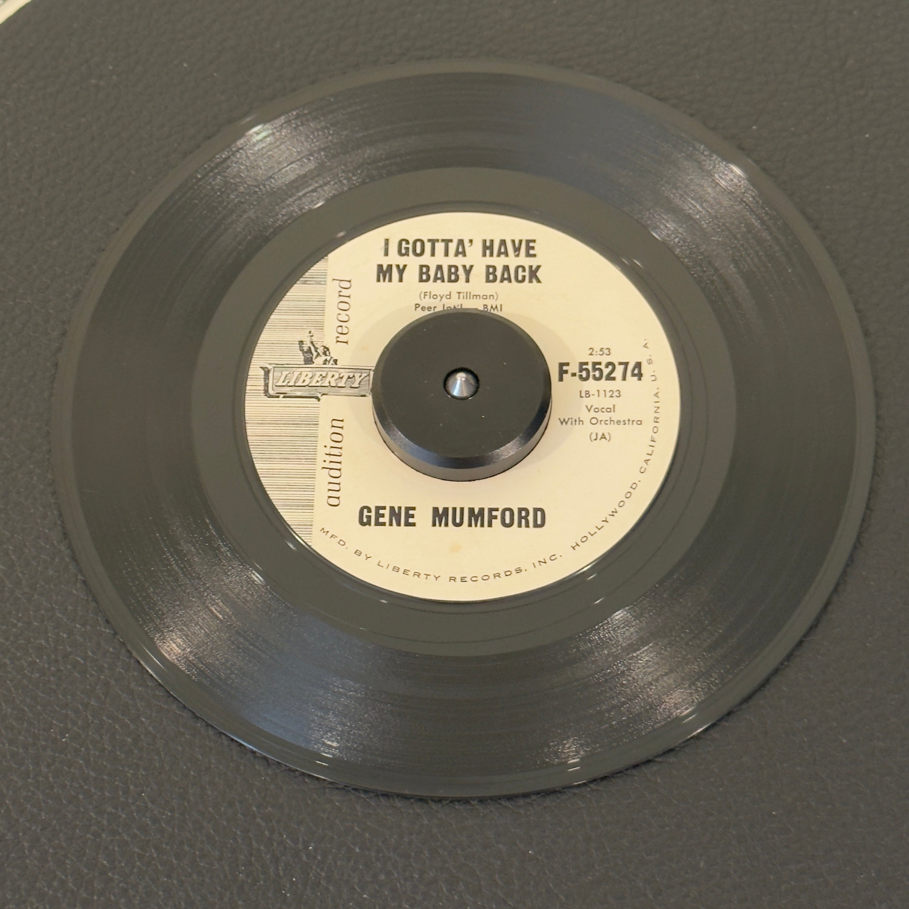 7" vinyl record by Gene Mumford featuring "I Gotta' Have My Baby Back/Brazil", released on Liberty (F-55274), in VG (Very Good) condition, classic analog collectable for turntable playback. Best known as the soaring lead tenor for legendary vocal groups like The Larks, The Dominoes, and The Cadillacs, Gene Mumford steps into the spotlight alone on this stellar Liberty Records release.
