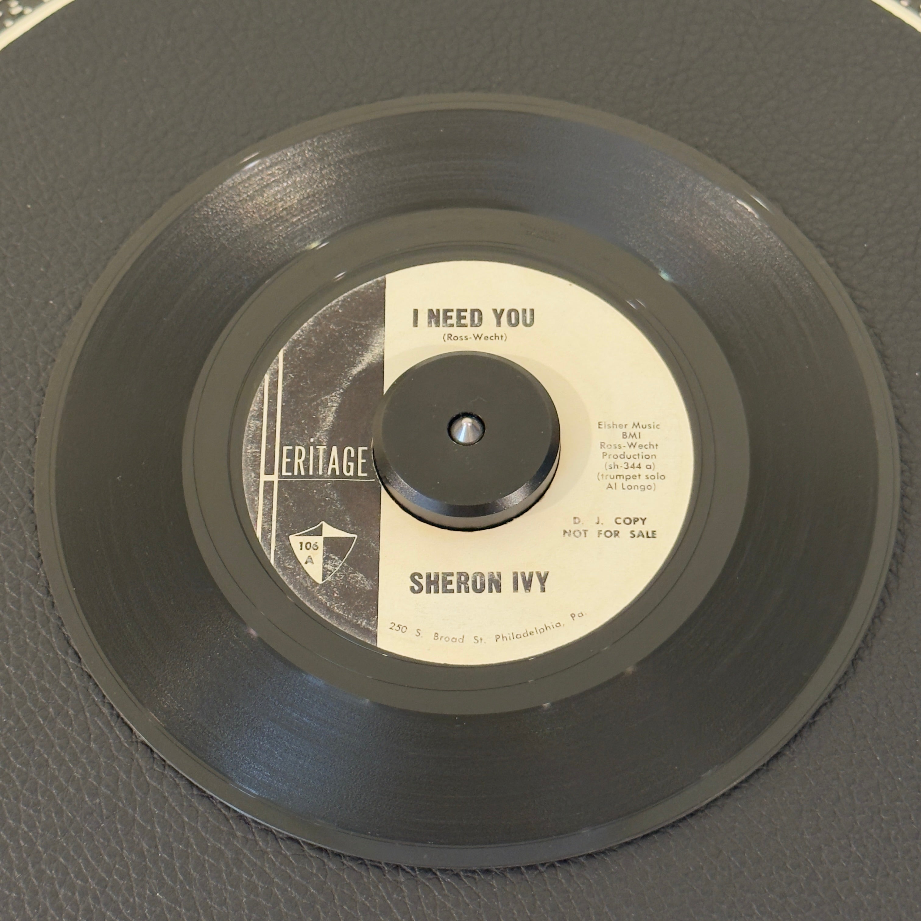 7" vinyl record by Sheron Ivy featuring "I Need You/Believe Me", released on Heritage (106), in VG (Very Good) condition, classic analog collectable for turntable playback. Incredibly tough-to-find white-label promo copy of the 1962 vocal group masterpiece.