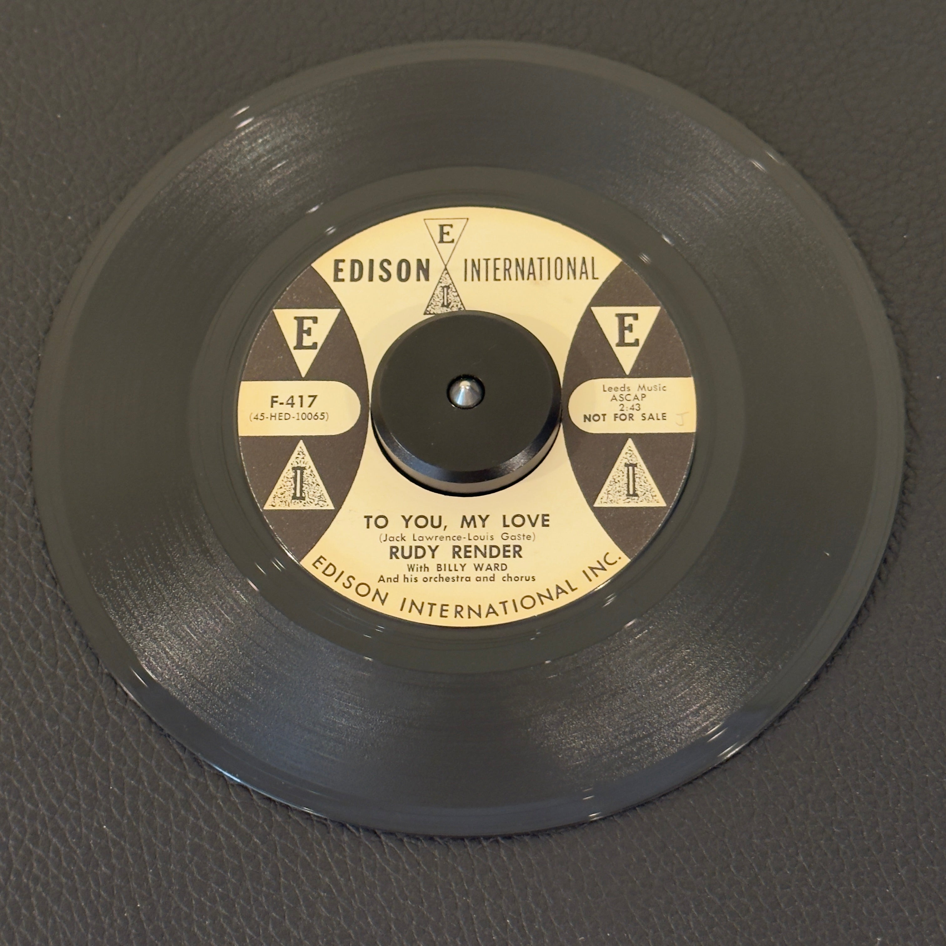7" vinyl record by Rudy Render featuring "To You, My Love/What'll I Do", released on Edison International (F-417), in VG+ (Very Good Plus) condition, classic analog collectable for turntable playback. 1960 US white-label promotional pressing of Rudy Render backed by Billy Ward & his orchestra.