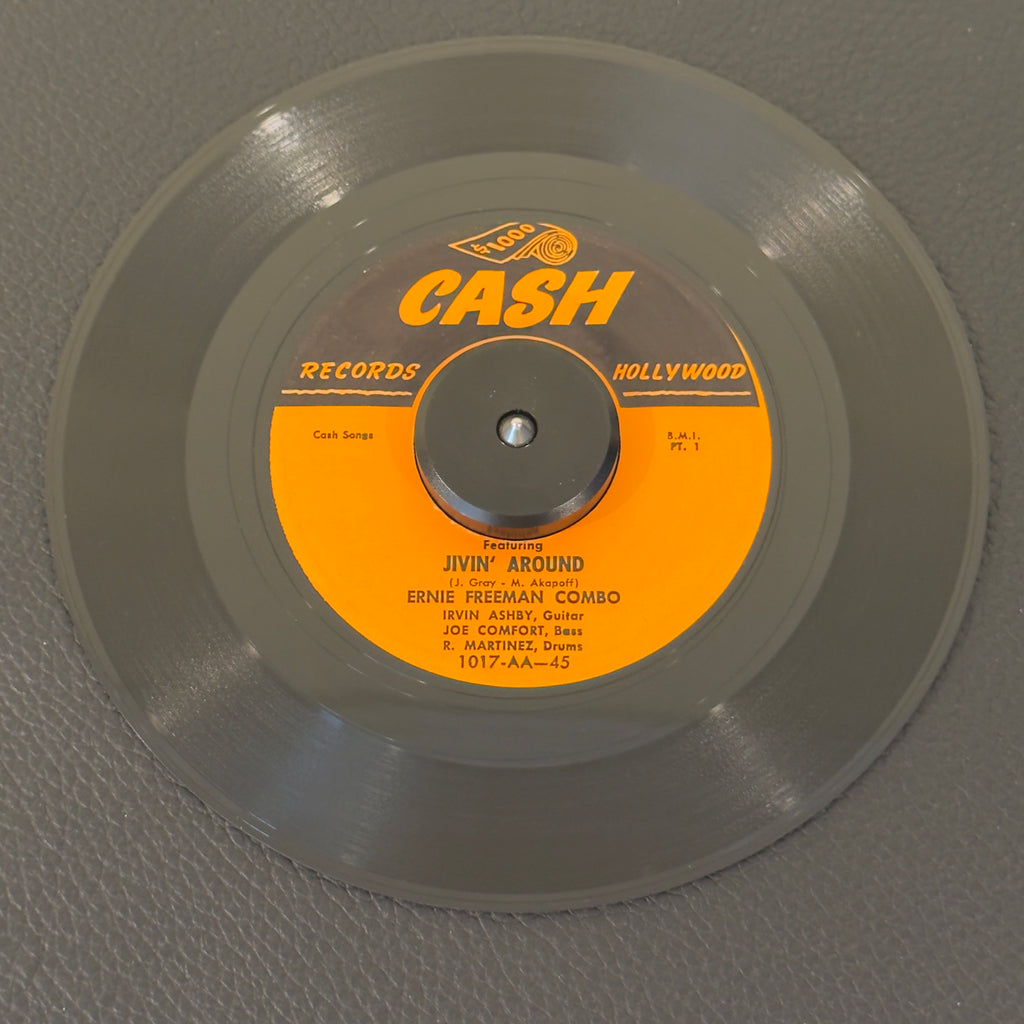 7" vinyl record by Ernie Freeman Combo featuring "Jivin' Around (Pt 1&2)", released on Cash Records (1017), in VG+ (Very Good Plus) condition, classic analog collectable for turntable playback. This track features Freeman's signature driving piano style and a soaring sax hook that made it a massive jukebox favorite across the country.