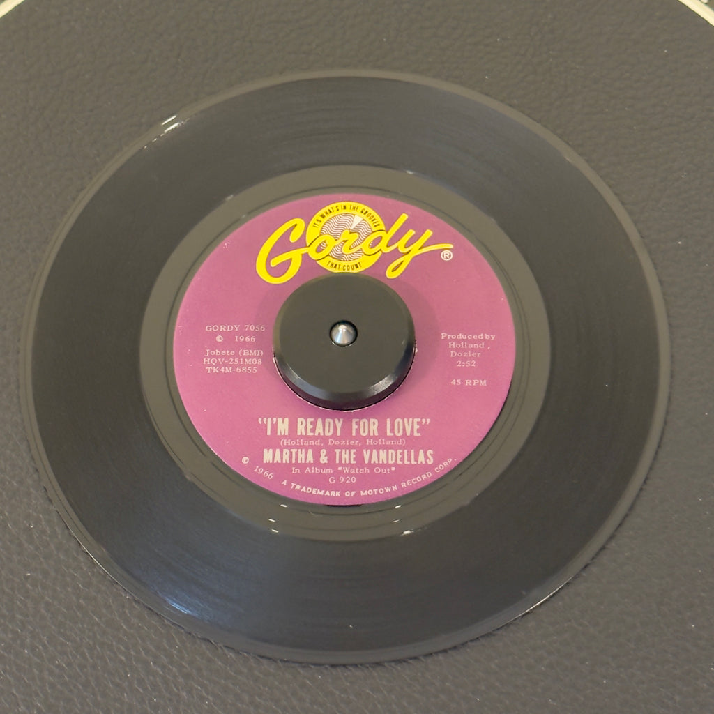 7" vinyl record by Martha & The Vandellas featuring "I'm Ready For Love/He Doesn't Love Her Anymore", released on Gordy (GORDY 7056), in VG+ (Very Good Plus) condition, classic analog collectable for turntable playback. 1966 high-energy Northern Soul and R&B staple that belongs in every serious DJ box and Motown collection.