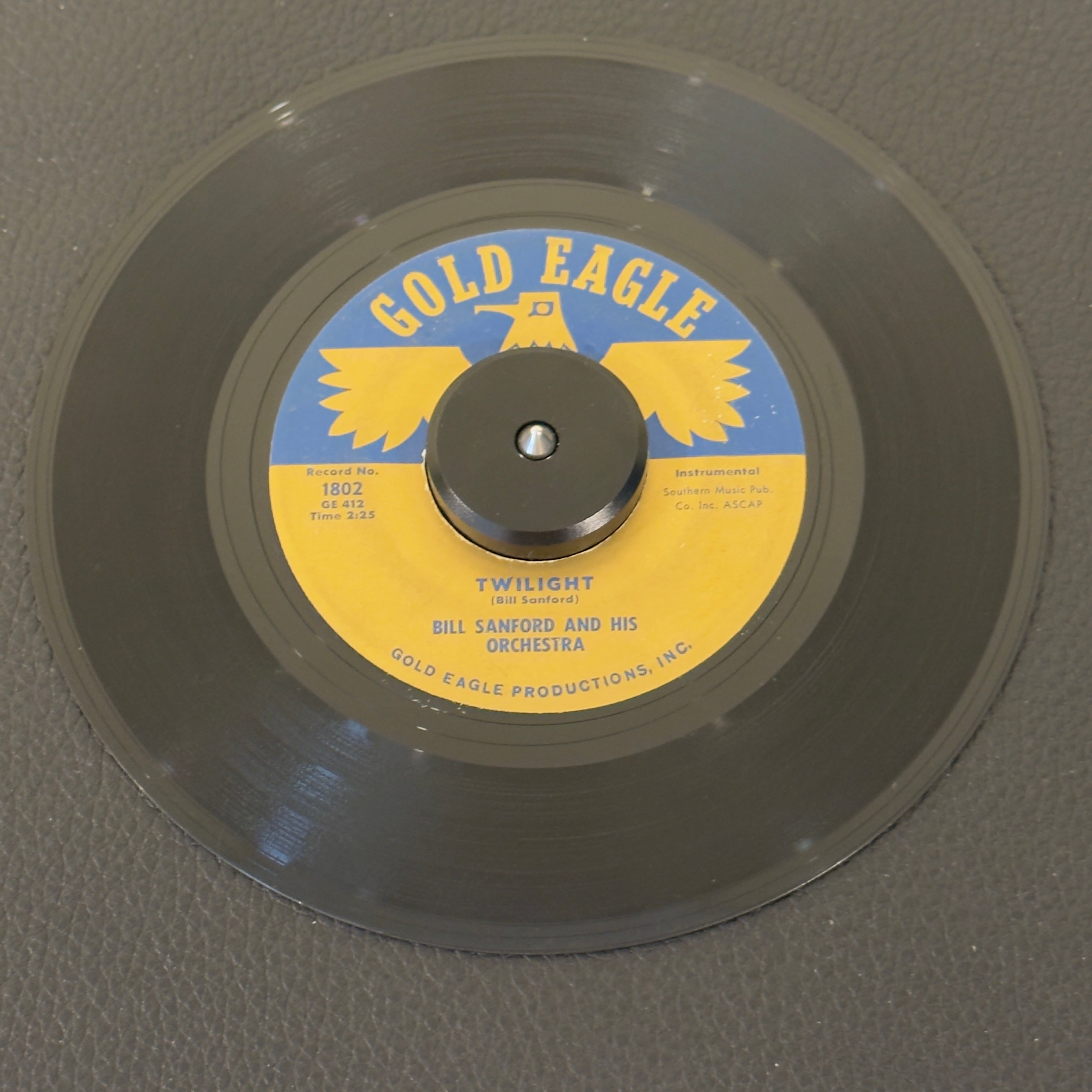 7" vinyl record by Bill Sanford and His Orchestra featuring "Twilight/Drumboogie", released on Gold Eagle (1802), in VG (Very Good) condition, classic analog collectable for turntable playback. 1960s highly distinct, rock-slanted Mod Jazz and Space-Age piece.