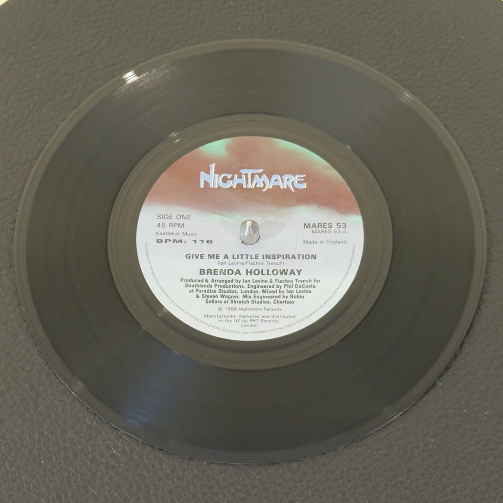 7" vinyl record by Brenda Holloway featuring "Give Me A Little Inspiration/(Instrumental)", released on Nightmare Records (MARES 53), in VG+ (Very Good Plus) condition, classic analog collectable for turntable playback. 1988 UK release - stellar example of late-80s British Hi-NRG and Modern Soul crossover.