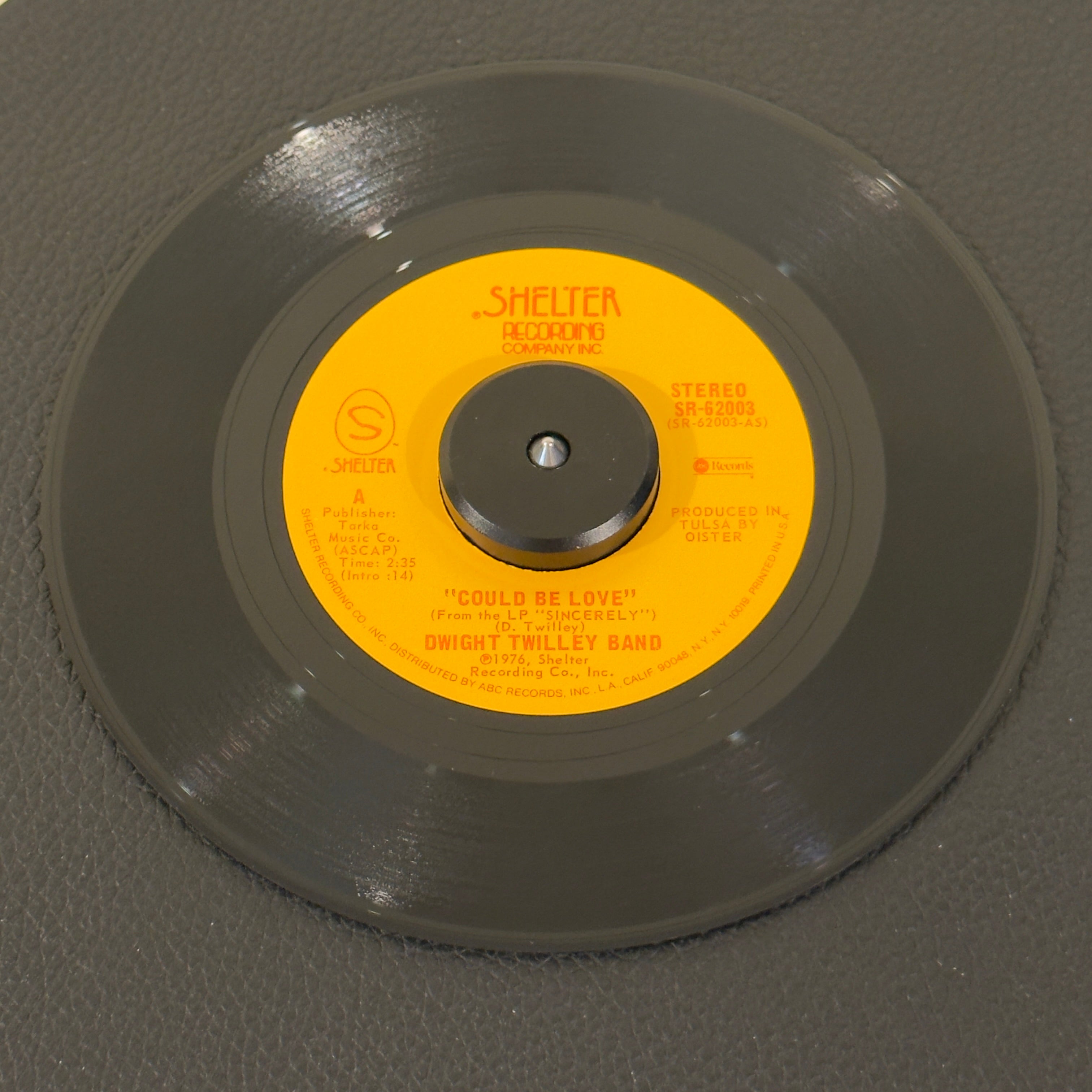 7" vinyl record by Dwight Twilley Band featuring "Could Be Love/Feeling In The Dark", released on Shelter Records (SR-62003), in NM (Near Mint) condition, classic analog collectable for turntable playback. Holy Grail for power-pop purists. Autographed pic sleeve included! Signed by Dwight Twilley and Phil Seymour.