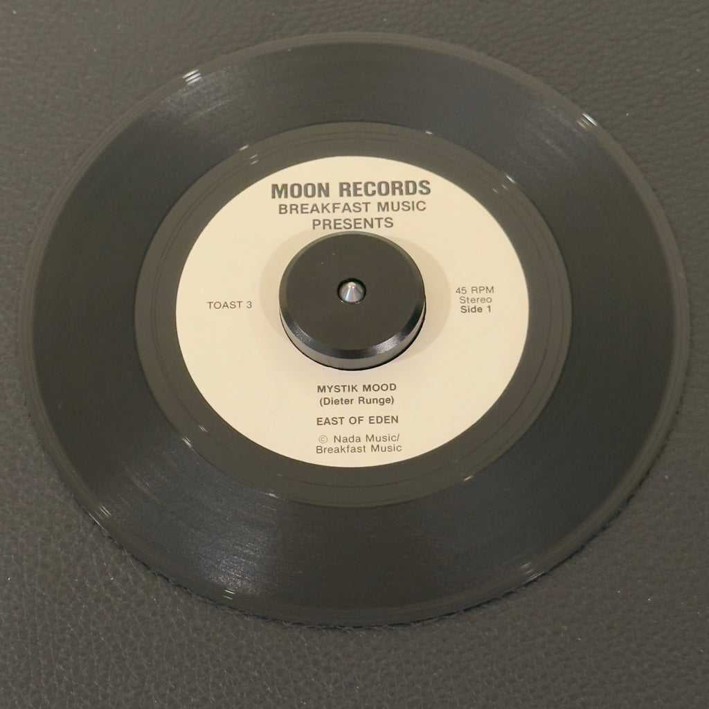 7" vinyl record by East of Eden featuring "Mystik Mood/Sea Of Happiness", released on Moon Records (Toast 3 / Toast 4), in VG+ (Very Good Plus) condition, classic analog collectable for turntable playback. 1984 incredibly rare slice of Lower East Side music history. Pic sleeve included. Only 1,000 copies were pressed.