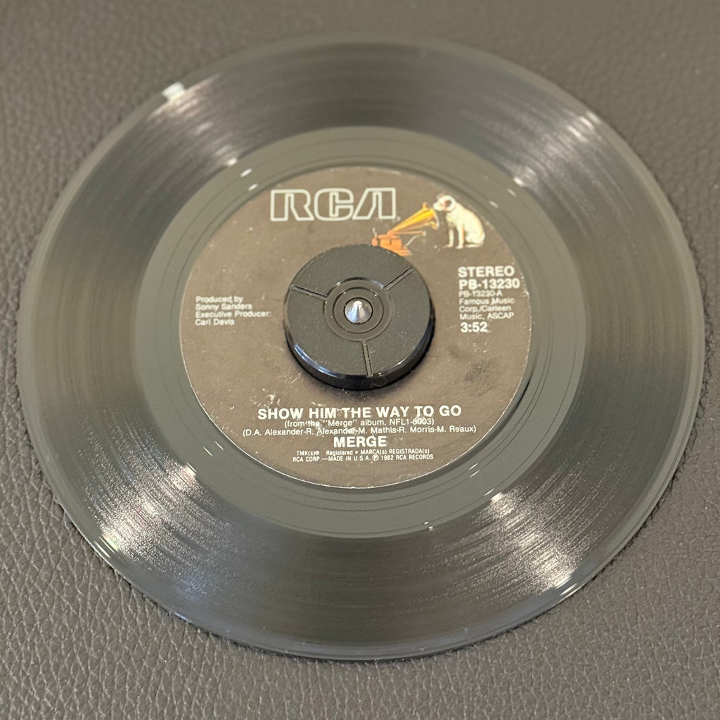 7" vinyl record by Merge featuring "Show Him The Way To Go/Heavenly", released on RCA (PB -13230), in VG+ (Very Good Plus) condition, classic analog collectable for turntable playback. Includes RCA sleeve.