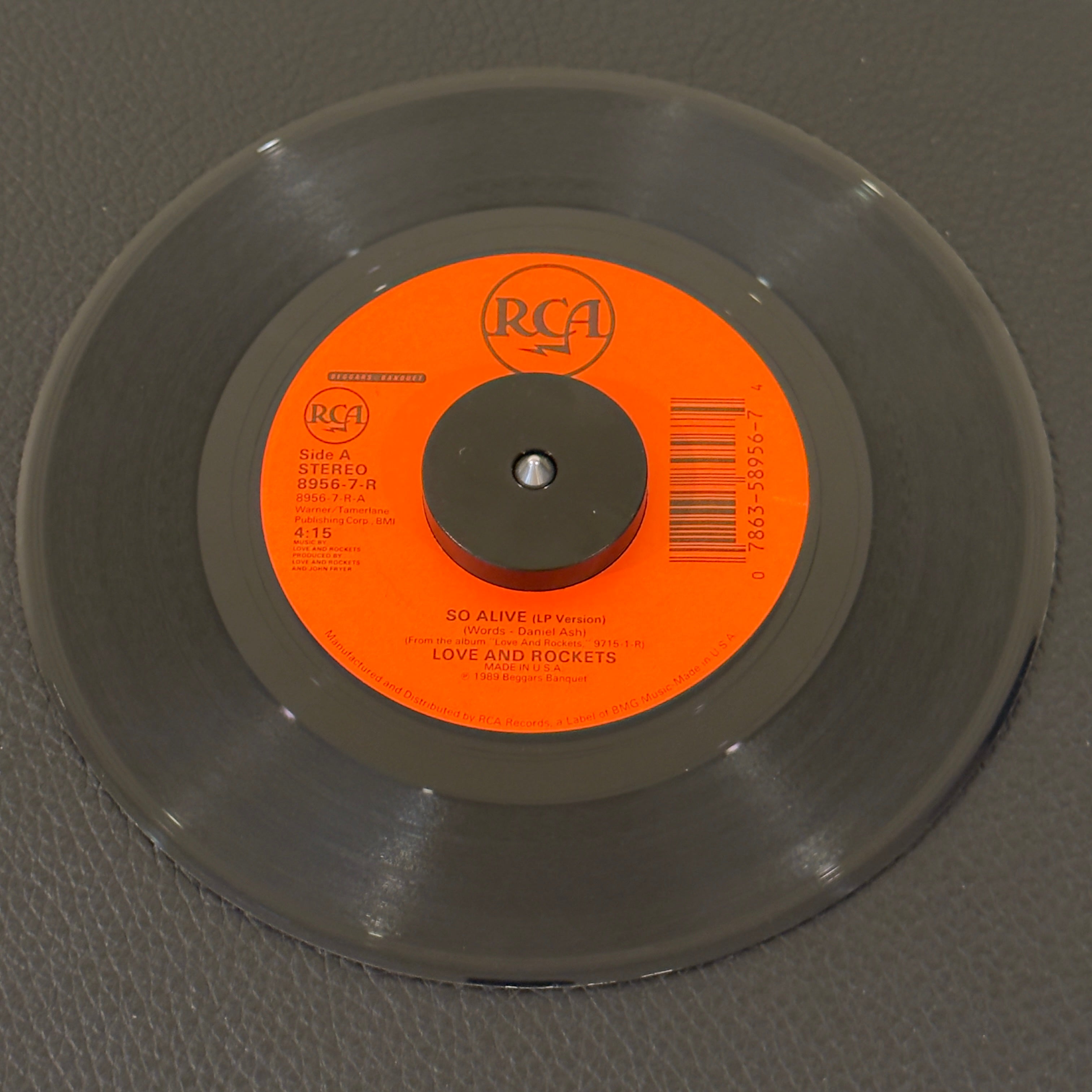 7" vinyl record by Love and Rockets featuring "So Alive (LP Version)/Dreamtime", released on RCA (8956-7-R), in VG (Very Good) condition, classic analog collectable for turntable playback.