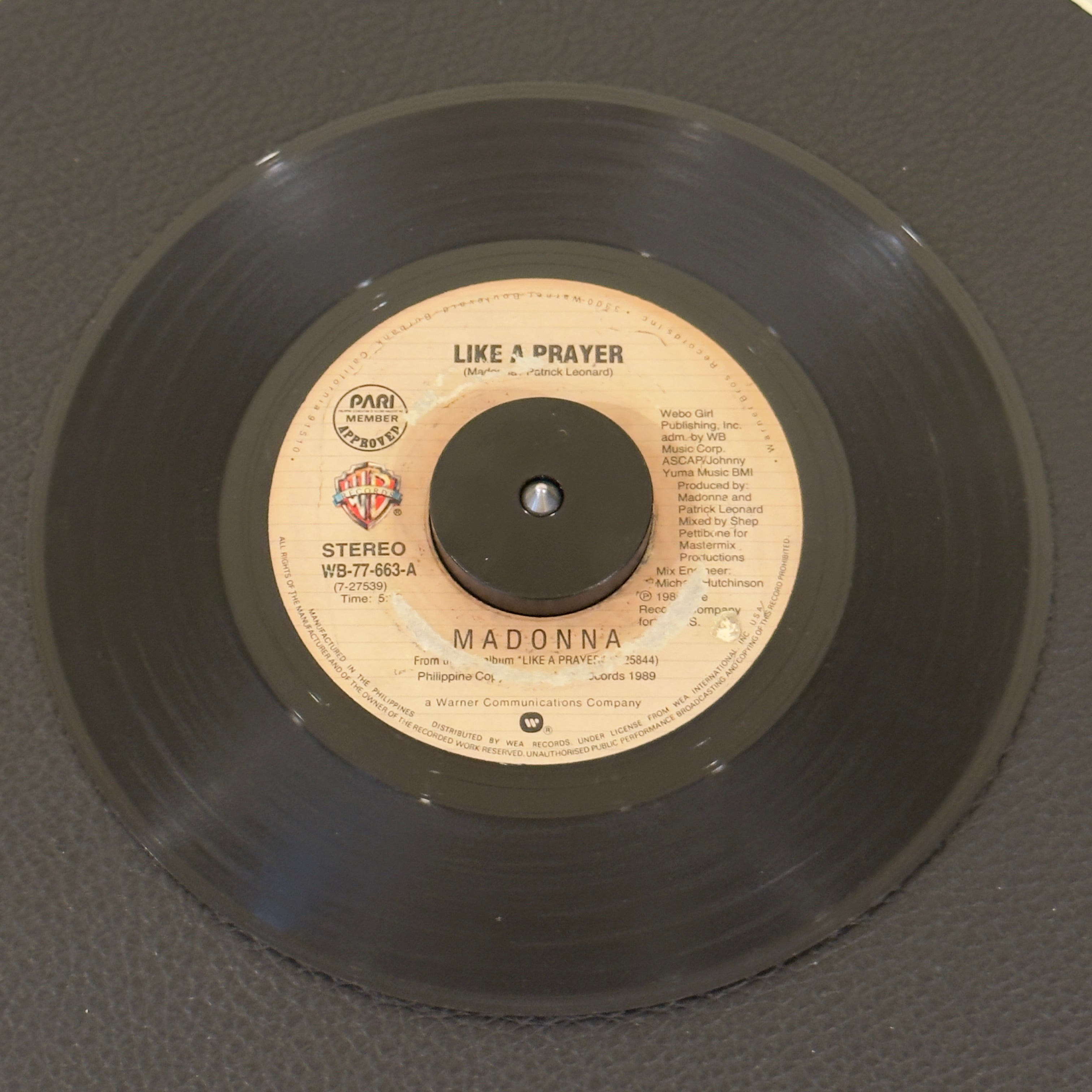 7" vinyl record by Madonna featuring "Like A Prayer/", released on Warner Bros. Records (WB-77-663), in G+ (Good Plus) condition, classic analog collectable for turntable playback. Super Rare Philippines pressing!  This is a G+ record and does play with some crackles.  WB sleeve included.