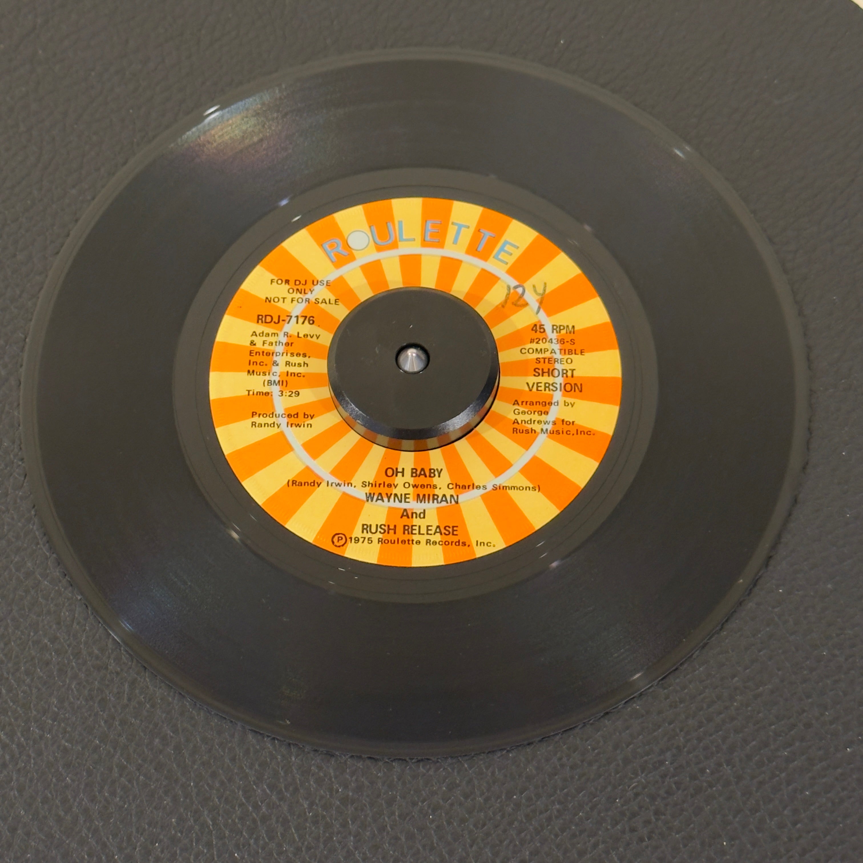 7" vinyl record by Wayne Miran and Rush Release featuring "Oh Baby/Oh Baby", released on Roulette (RDJ-7176), in VG+ (Very Good Plus) condition, classic analog collectable for turntable playback. Promotional copy! This exceptional quartet production serves as a textbook bridge between classic Florida-style soul and early disco grooves. WOL - Original sleeve.