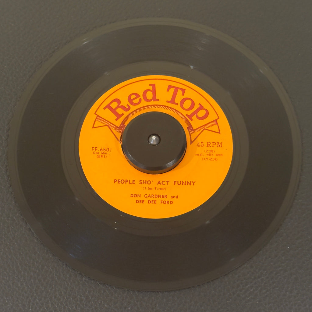 7" vinyl record by Don Gardner & Dee Dee Ford featuring "People Sho' Act Funny/Shake A Leg, Baby", released on Red Top (FF-6501), in VG (Very Good) condition, classic analog collectable for turntable playback. Original 1963 single featuring the high-octane Mod R&B double-sider by the legendary duo Don Gardner & Dee Dee Ford.