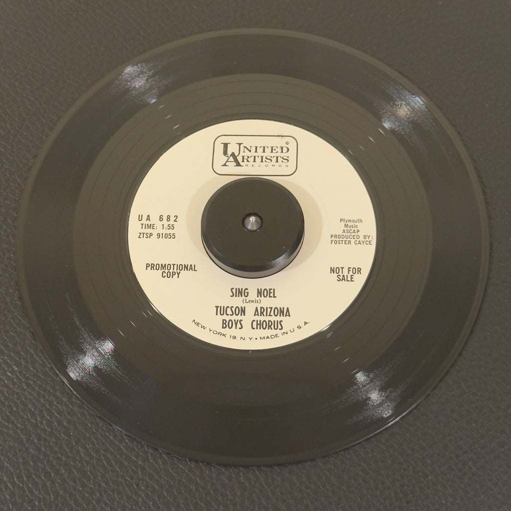 7" vinyl record by Tucson Arizona Boys Chorus featuring "Sing Noel/Sleep Little Tiny King", released on United Artists Records (UA 682), in NM (Near Mint) condition, classic analog collectable for turntable playback. Vintage release features two magnificent seasonal performances directed during the group's mid-60s golden era. Perfect for choral collectors and holiday music enthusiasts.