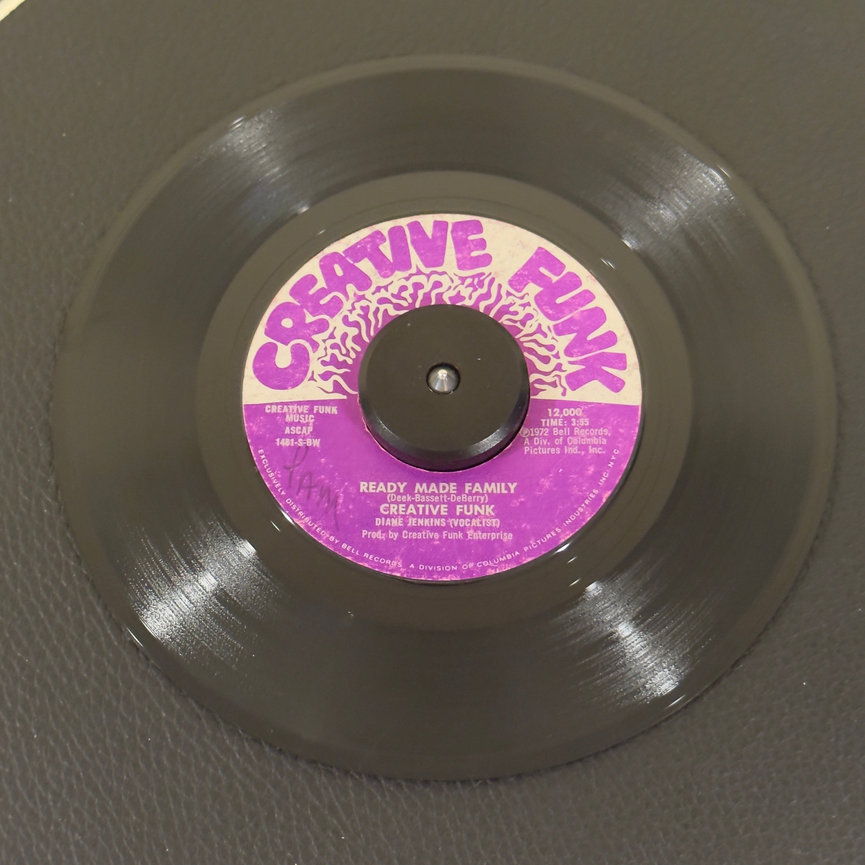 7" vinyl record by Creative Funk featuring "Ready Made Family/Funk Power", released on Creative Funk (CF 12,000), in VG (Very Good) condition, classic analog collectable for turntable playback. This 1972 self-released boutique single is a killer addition for deep funk DJs and sweet soul collectors alike.