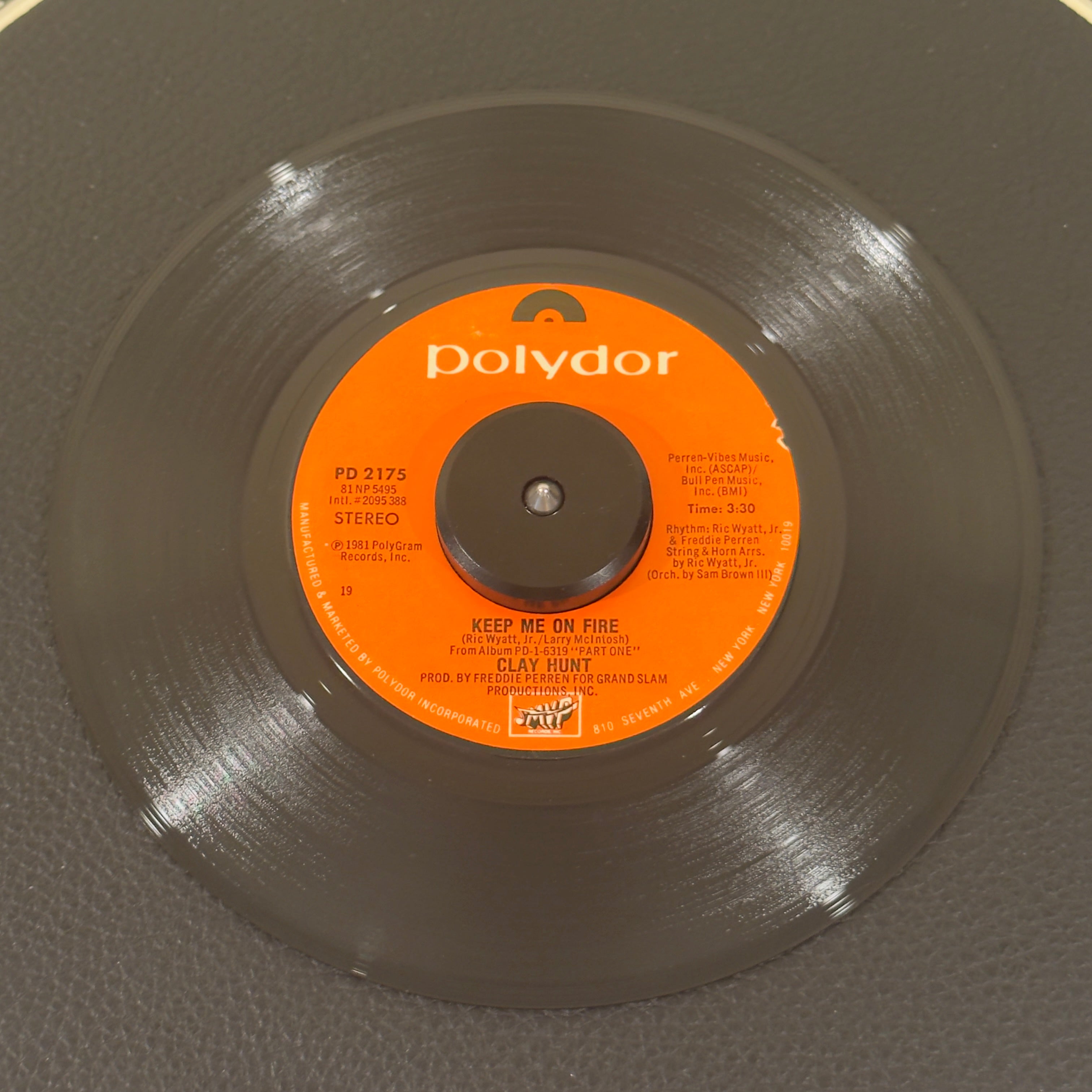 7" vinyl record by Clay Hunt featuring "Keep Me On Fire/Midnight Plane", released on Polydor (PD 2175), in VG+ (Very Good Plus) condition, classic analog collectable for turntable playback. An excellent, atmospheric R&B stepper that rounds out a fantastic early-80s double-sider. Original Polydor sleeve included.