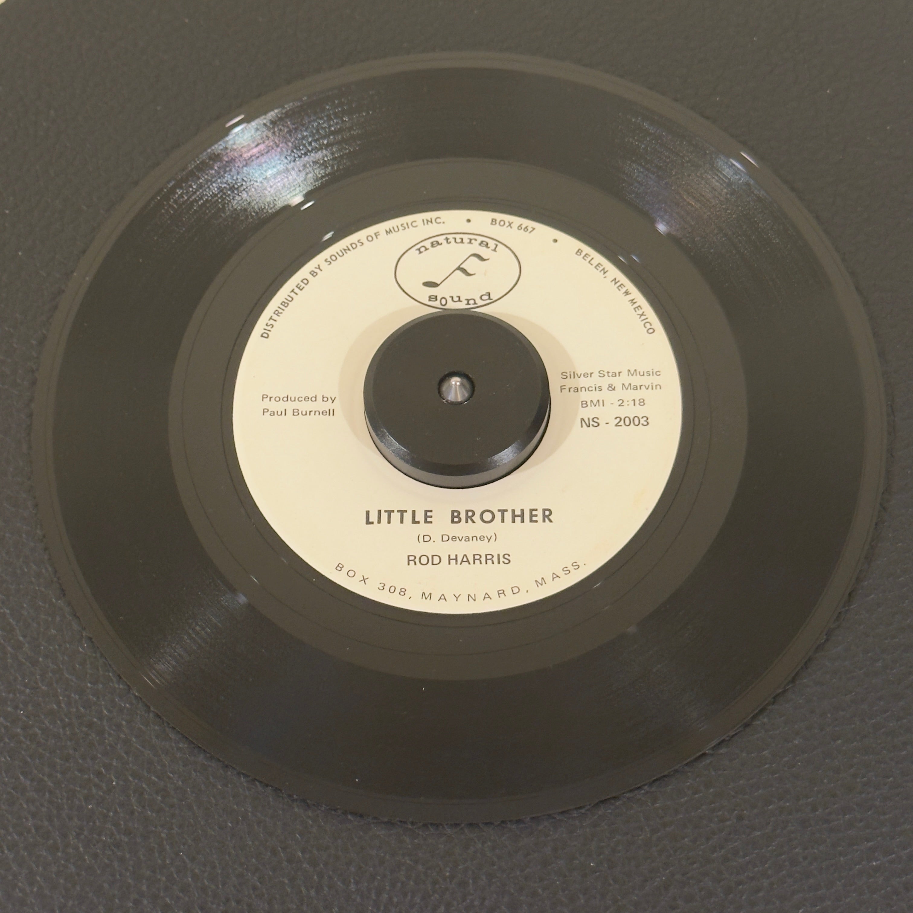 7" vinyl record by Rod Harris featuring "Little Brother/A Letter To Faron Young", released on Natural Sound (NS-2003), in VG+ (Very Good Plus) condition, classic analog collectable for turntable playback. This micro-press indie single is a tough-to-find curiosity piece for collectors of private-press country music, localized 1960s indie labels, and obscure songwriting histories.
