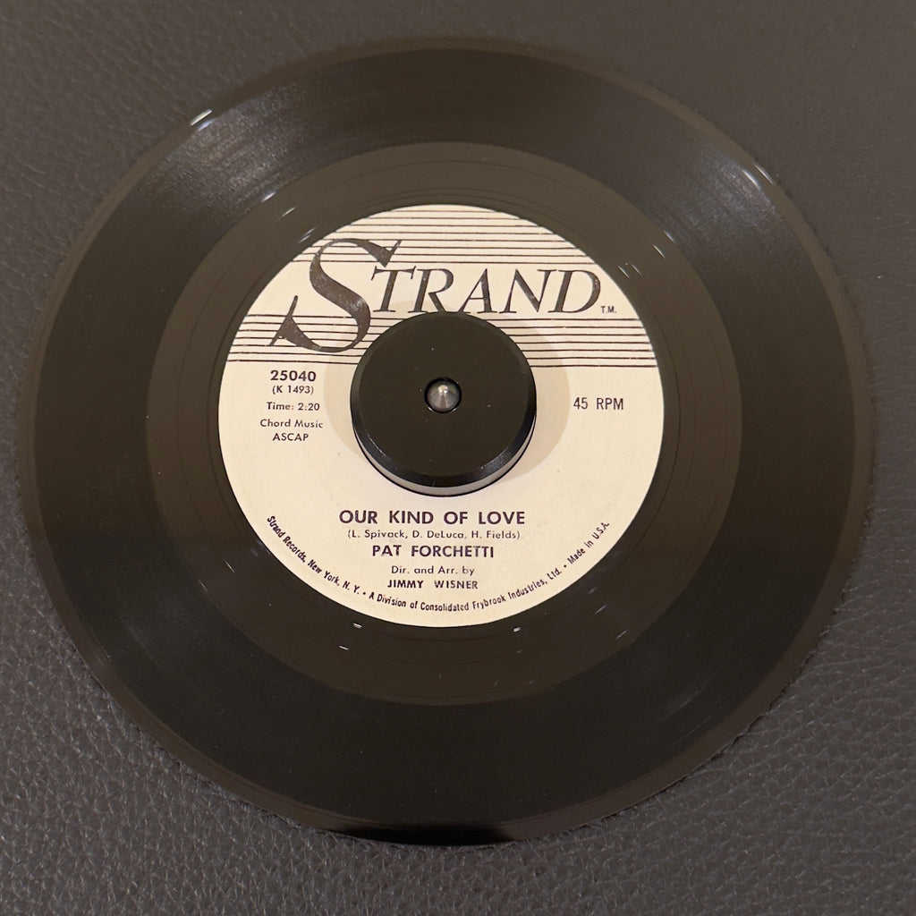 7" vinyl record by Pat Forchetti featuring "Young Lover/Our Kind Of Love", released on Strand (25040), in VG+ (Very Good Plus) condition, classic analog collectable for turntable playback.