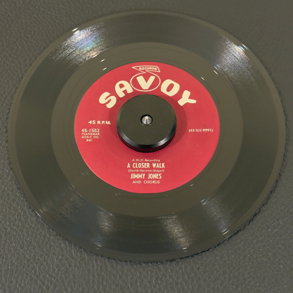 7" vinyl record by Jimmy Jones featuring "A Closer Walk/Somebody Bigger Than You And I", released on Savoy Records (45-1553), in VG+ (Very Good Plus) condition, classic analog collectable for turntable playback. A Fantastic 1958 piece of traditional Gospel and Soul history that is Perfect for collectors of vintage gospel, early soul, and Savoy label completists.