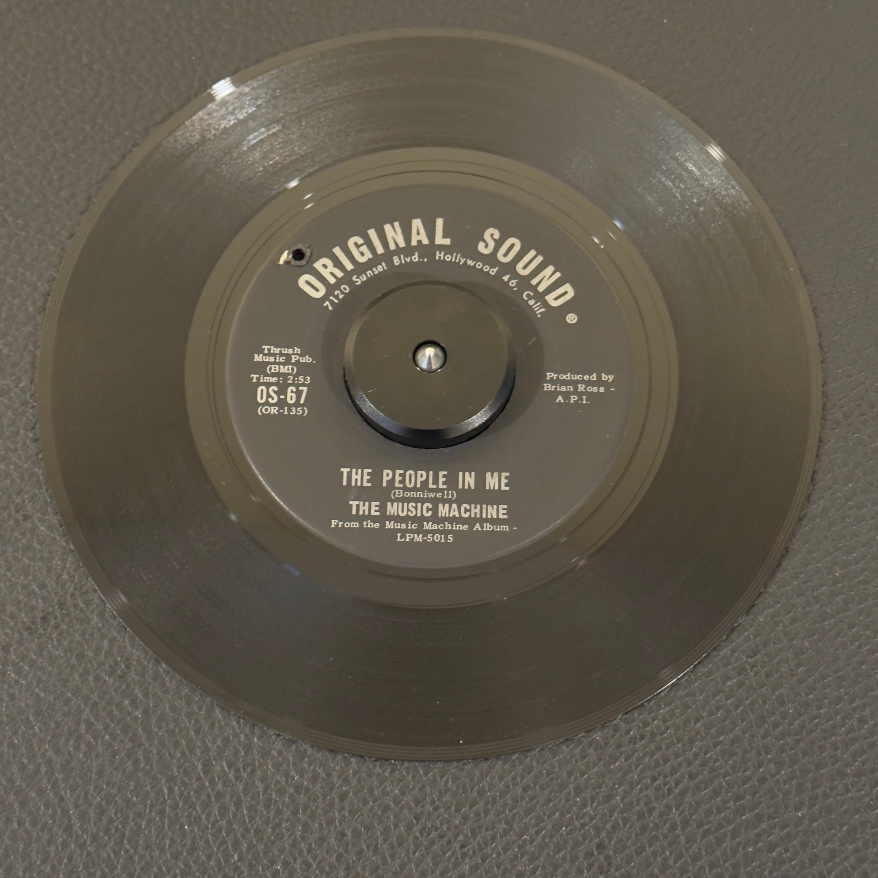 7" vinyl record by Music Machine, The featuring "The People In Me/Masculine Intuition", released on Original Sound (OS-67), in VG (Very Good) condition, classic analog collectable for turntable playback. Driven by Sean Bonniwell's distinctive vocals and a legendary punk fuzz bass line, this is a quintessential slice of 60s garage psych history that belongs in any rock collection.
