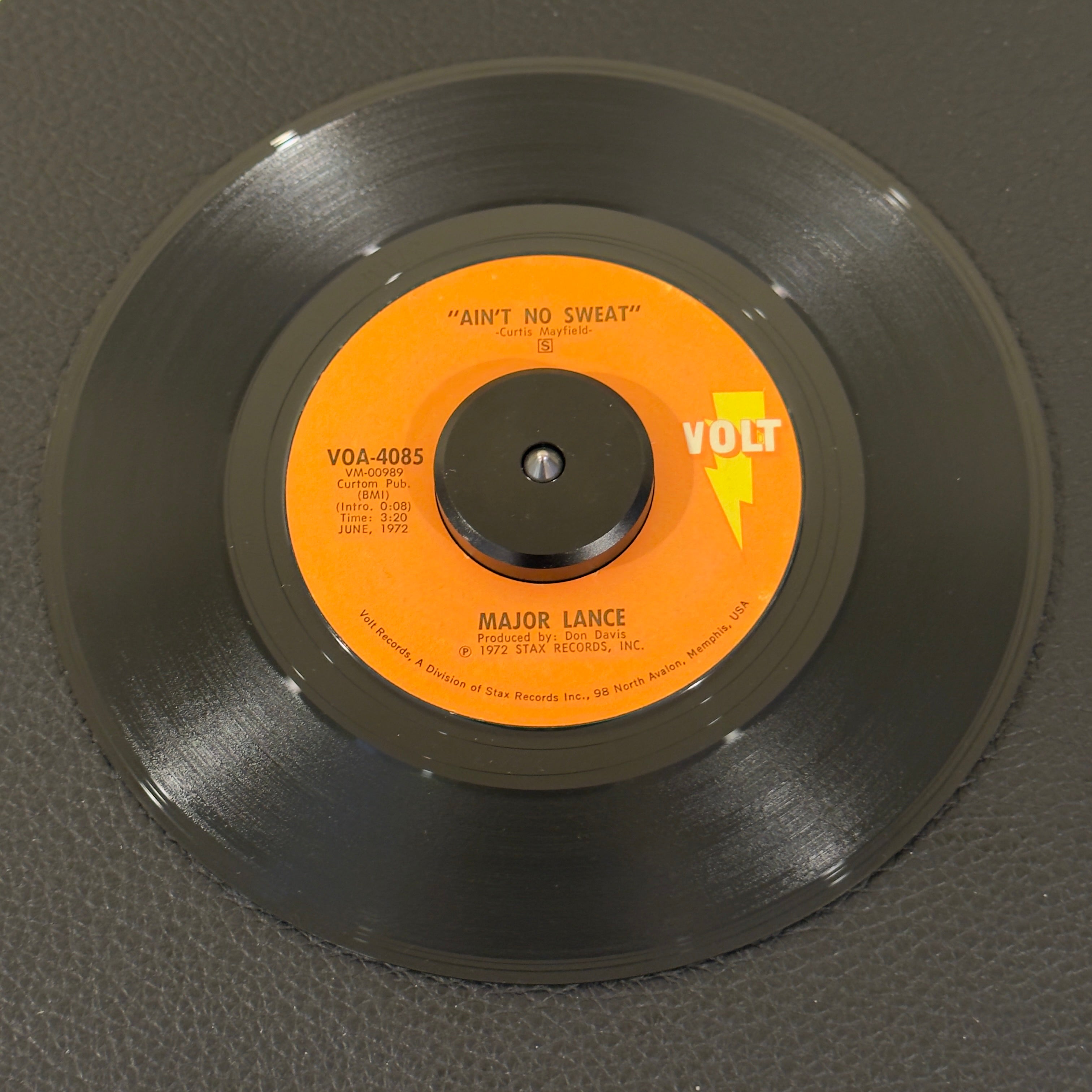 7" vinyl record by Major Lance featuring "Ain't No Sweat/Since I Lost My Baby's Love", released on Volt (VOA-4085), in VG (Very Good) condition, classic analog collectable for turntable playback. This track carries serious musical pedigree: written by the irreplaceable Curtis Mayfield and produced by Detroit master-arranger Don Davis.  WOL