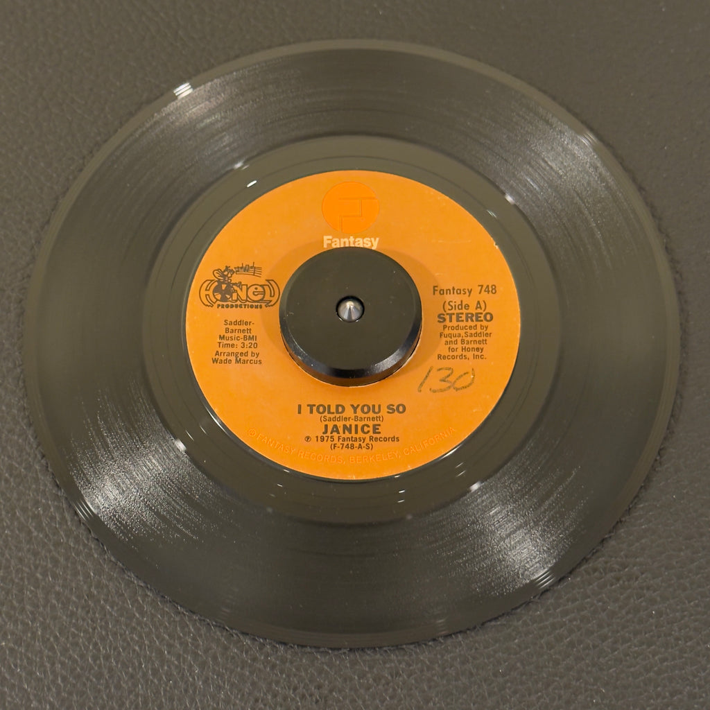 7" vinyl record by Janice featuring "I Told You So/Him", released on Fantasy (Fantasy 748), in NM (Near Mint) condition, classic analog collectable for turntable playback. Elevate your vintage soul box with an absolutely immaculate, collector-grade specimen of this original 1975 single. WOL
