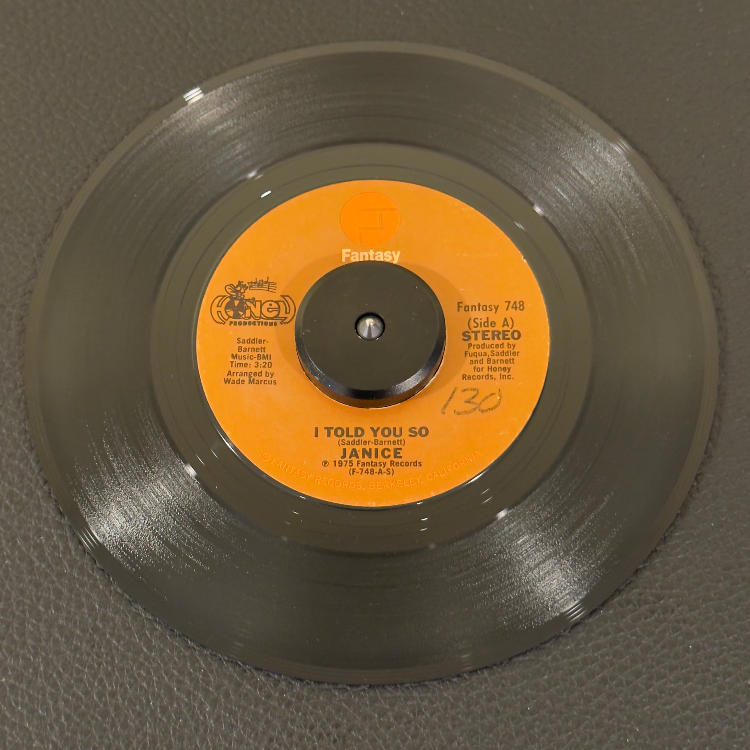 7" vinyl record by Janice featuring "I Told You So/Him", released on Fantasy (Fantasy 748), in NM (Near Mint) condition, classic analog collectable for turntable playback. Elevate your vintage soul box with an absolutely immaculate, collector-grade specimen of this original 1975 single. WOL