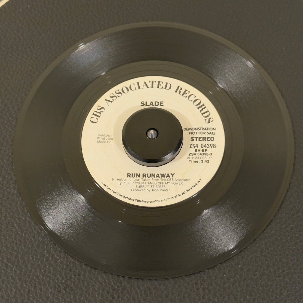 7" vinyl record by Slade featuring "Run Runaway/Run Runaway", released on CBS Associated Records (ZS4 04398), in VG+ (Very Good Plus) condition, classic analog collectable for turntable playback. Lock down this beautifully preserved 1984 pop-metal promo banger!!