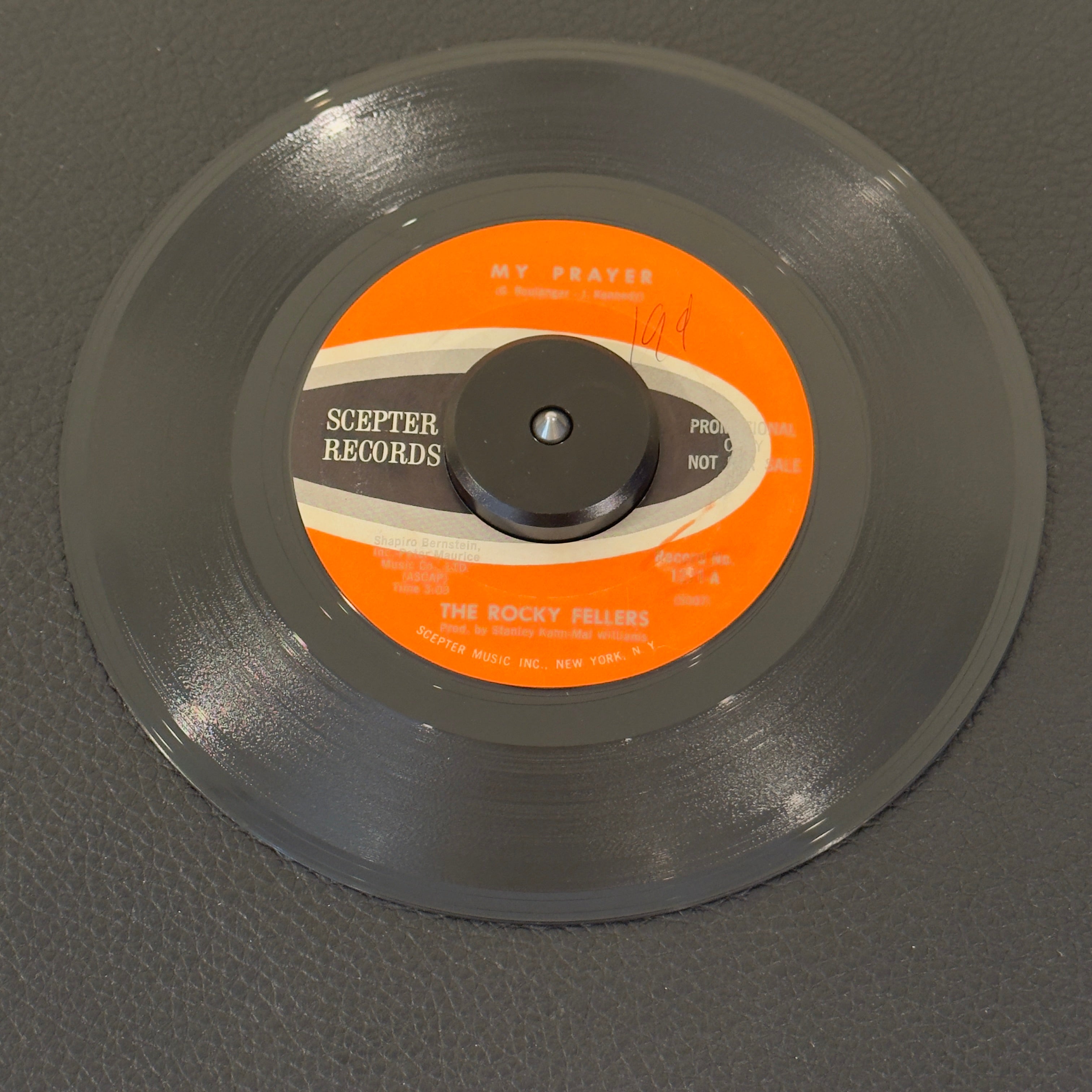 7" vinyl record by Rocky Fellers, The featuring "My Prayer/Two Guys From Trinidad", released on Scepter Records (1271), in VG+ (Very Good Plus) condition, classic analog collectable for turntable playback. An exceptional find for 1960s pop-soul and doo-wop collectors! Promotional copy in the original Scepter sleeve.  WOL