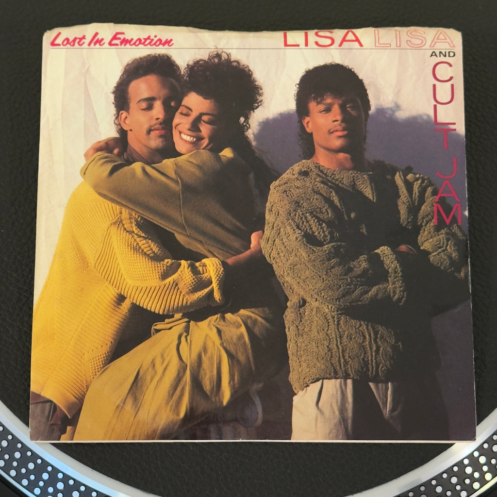 7" vinyl record by Lisa Lisa and The Cult Jam featuring "Lost In Emotion/Motion Is Lost", released on Columbia (38-07267), in VG+ (Very Good Plus) condition, classic analog collectable for turntable playback. 1987 single features Lisa Lisa and Cult Jam performing their iconic, Billboard Billboard Hot 100 #1 hit "Lost In Emotion." Pic sleeve included.