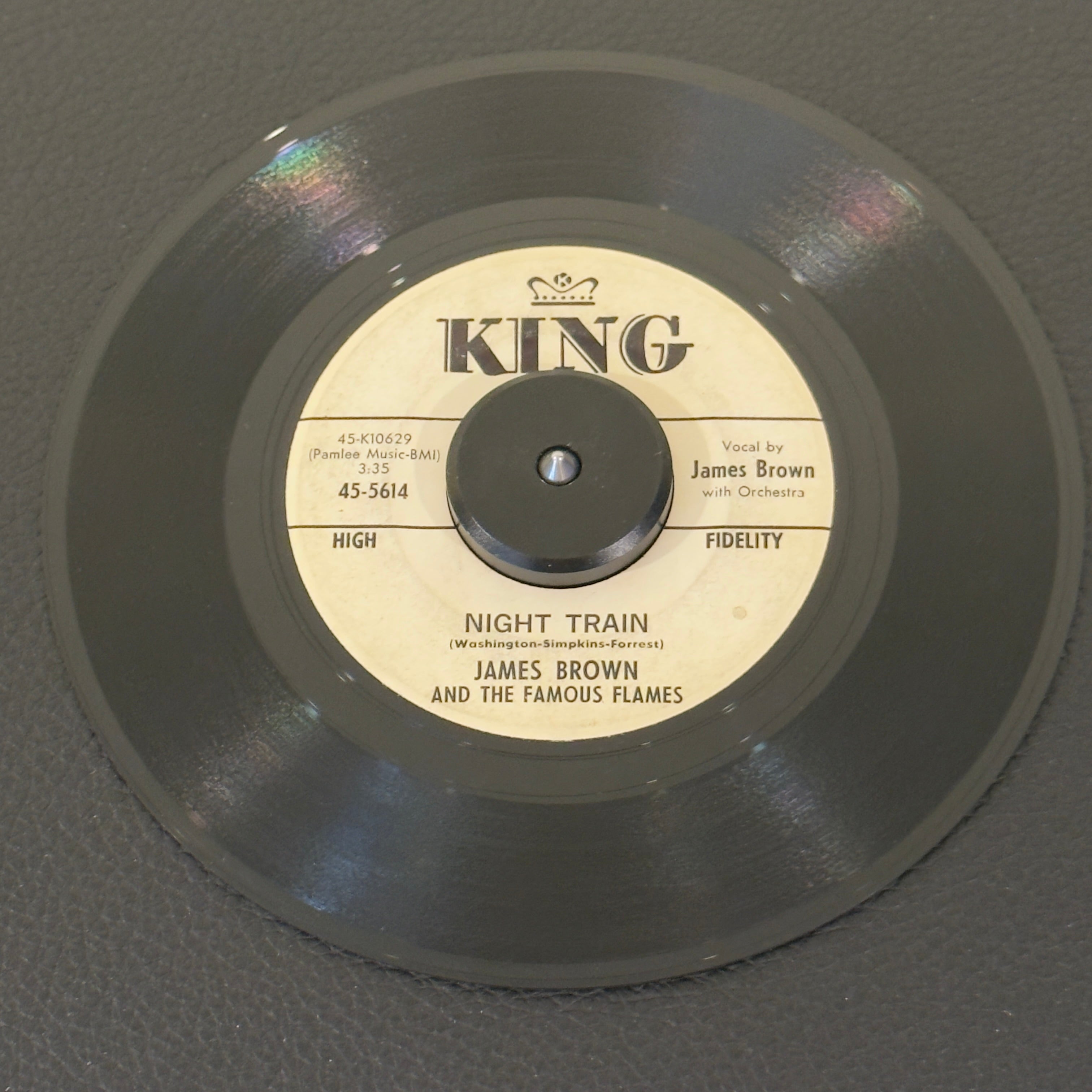 7" vinyl record by James Brown featuring "Night Train/Why Does Everything Happen To Me", released on King Records (45-5614), in G+ (Good Plus) condition, classic analog collectable for turntable playback. Original 1962 White Label Copy single featuring the Godfather of Soul! Original King factory sleeve included.