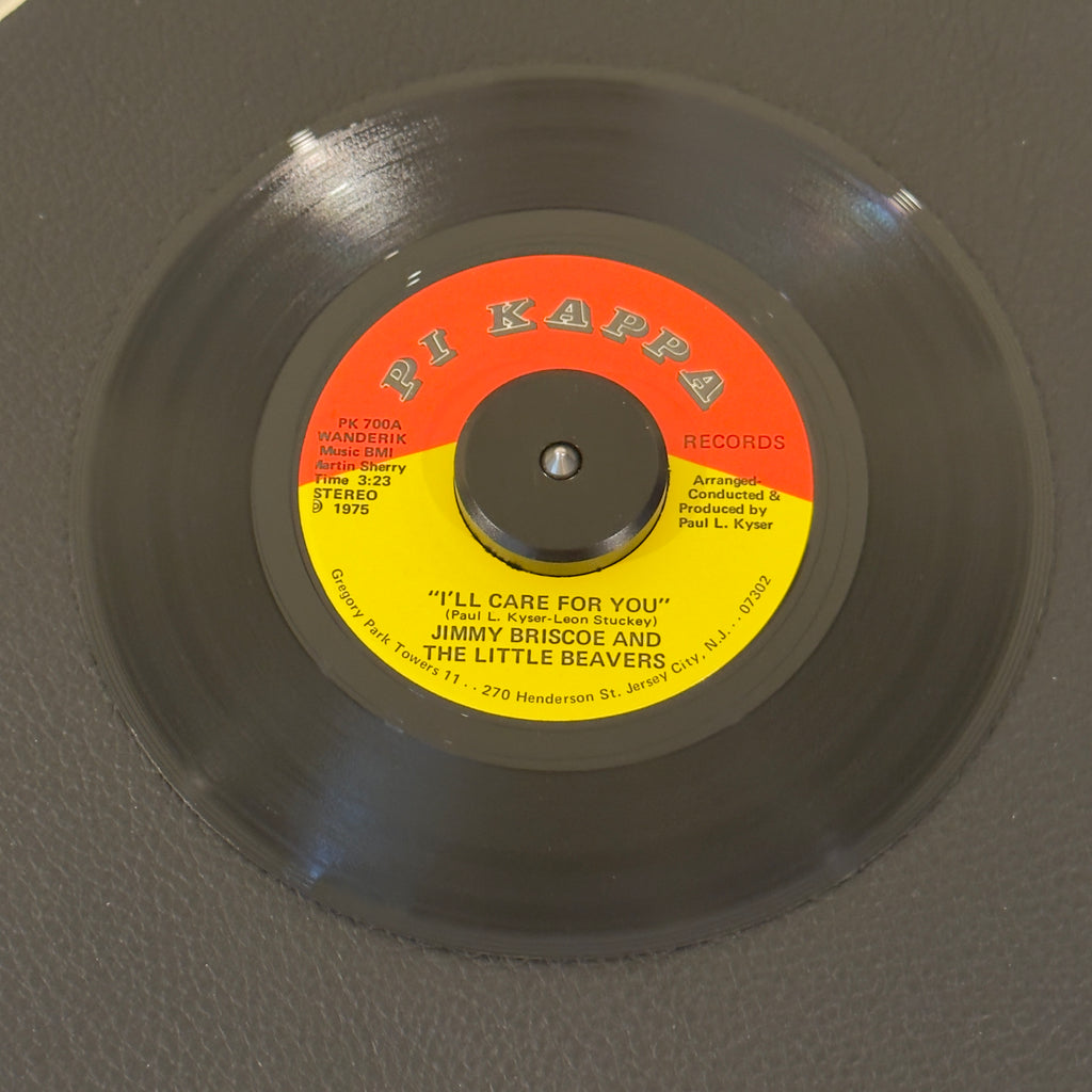 7" vinyl record by Jimmy Brisco & The Little Beavers featuring "I'll Care For You/Movin' On", released on Pi Kappa Records (PK 700), in NM (Near Mint) condition, classic analog collectable for turntable playback. Produced by the great Paul Kyser, this single perfectly captures the group's lush vocal harmonies on the A-side ballad, backed by a driving disco-funk groove on the flip side.