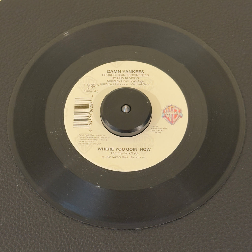 7" vinyl record by Damn Yankees featuring "Where You Goin' Now (Radio Edit)/This Side Of Hell (Album Version)", released on Warner Bros. Records (7-18728), in NM (Near Mint) condition, classic analog collectable for turntable playback. US pressing featuring the stellar supergroup combination of Tommy Shaw, Jack Blades, and Ted Nugent at their melodic best.