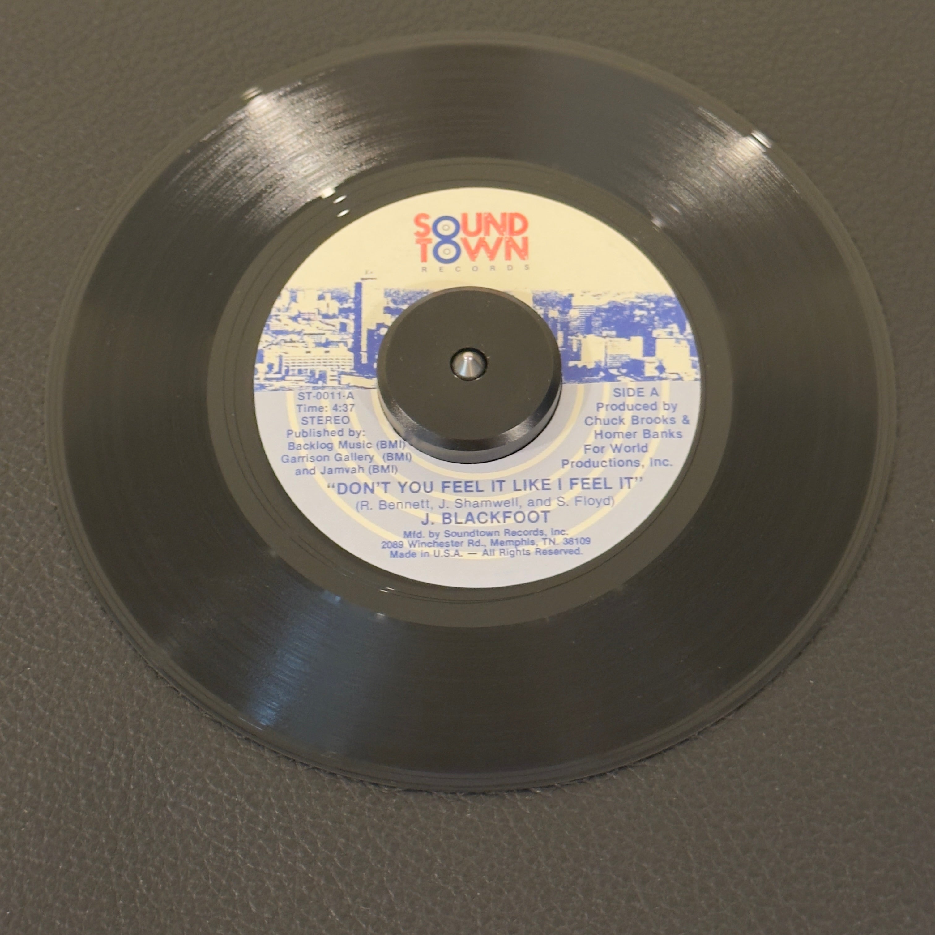 7" vinyl record by J. Blackfoot featuring "Don't You Feel It Like I Feel It/You Can't Take It With You", released on Soundtown Records (ST-0011), in NM (Near Mint) condition, classic analog collectable for turntable playback. This original US pressing captures the legendary Soul Children frontman at his absolute best.