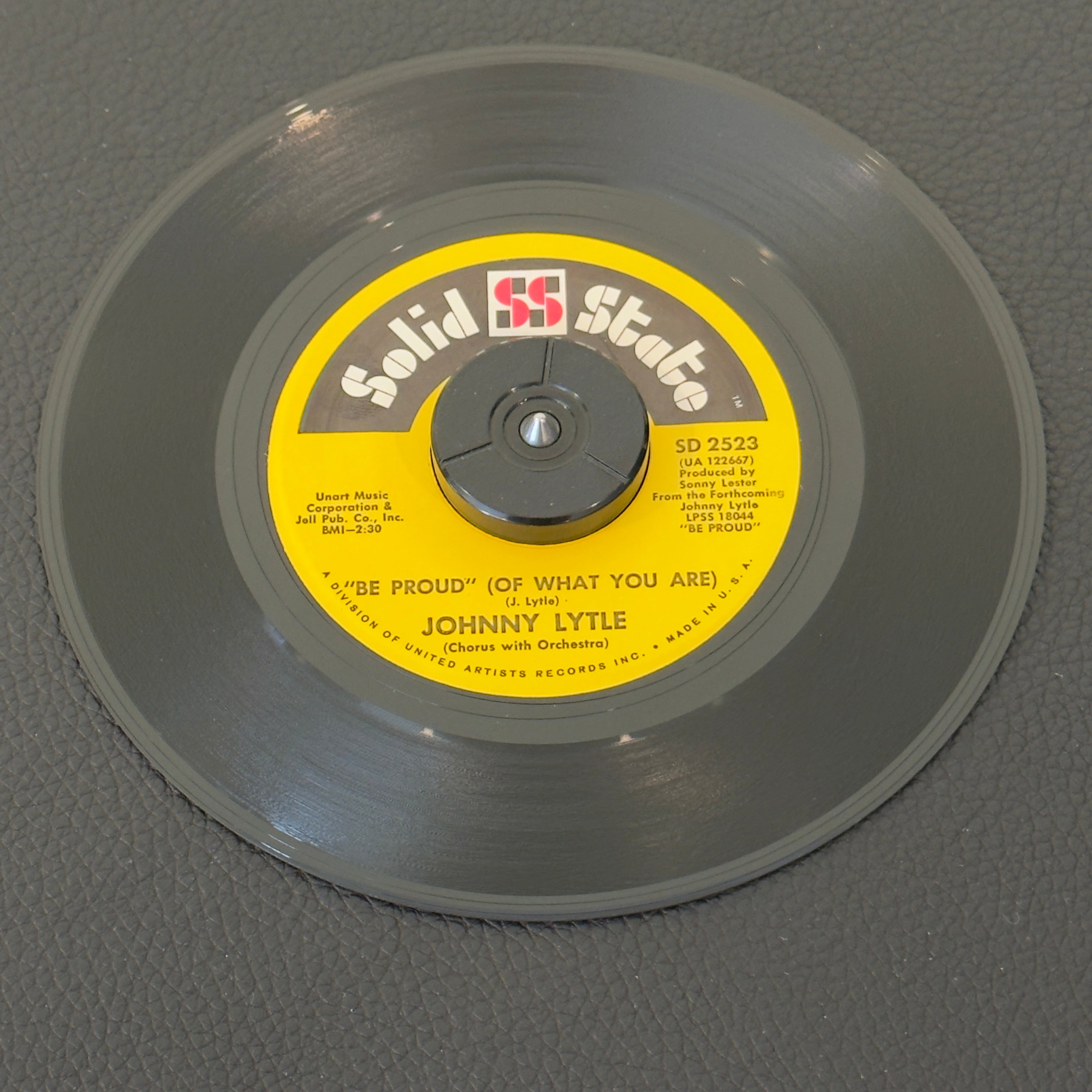 7" vinyl record by Johnny Lytle featuring "Be Proud (Of What You Are)/You've Got To Love The World", released on Solid State Records (SD 2523), in NM (Near Mint) condition, classic analog collectable for turntable playback.