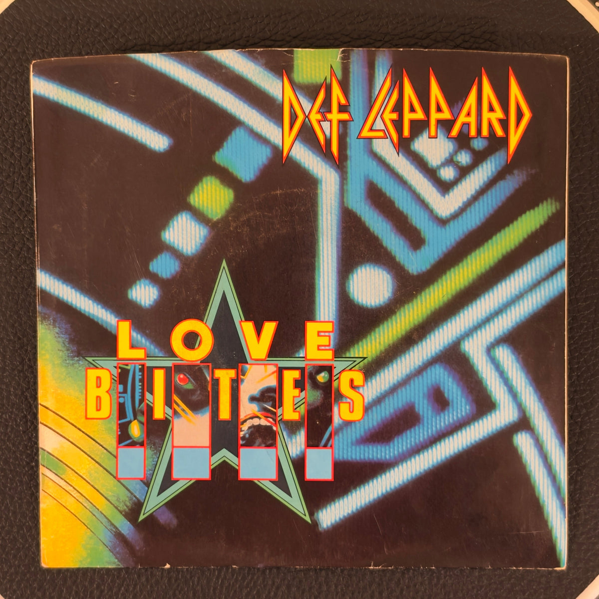 Def Leppard – Love Bites / Billy's Got A Gun (Live)