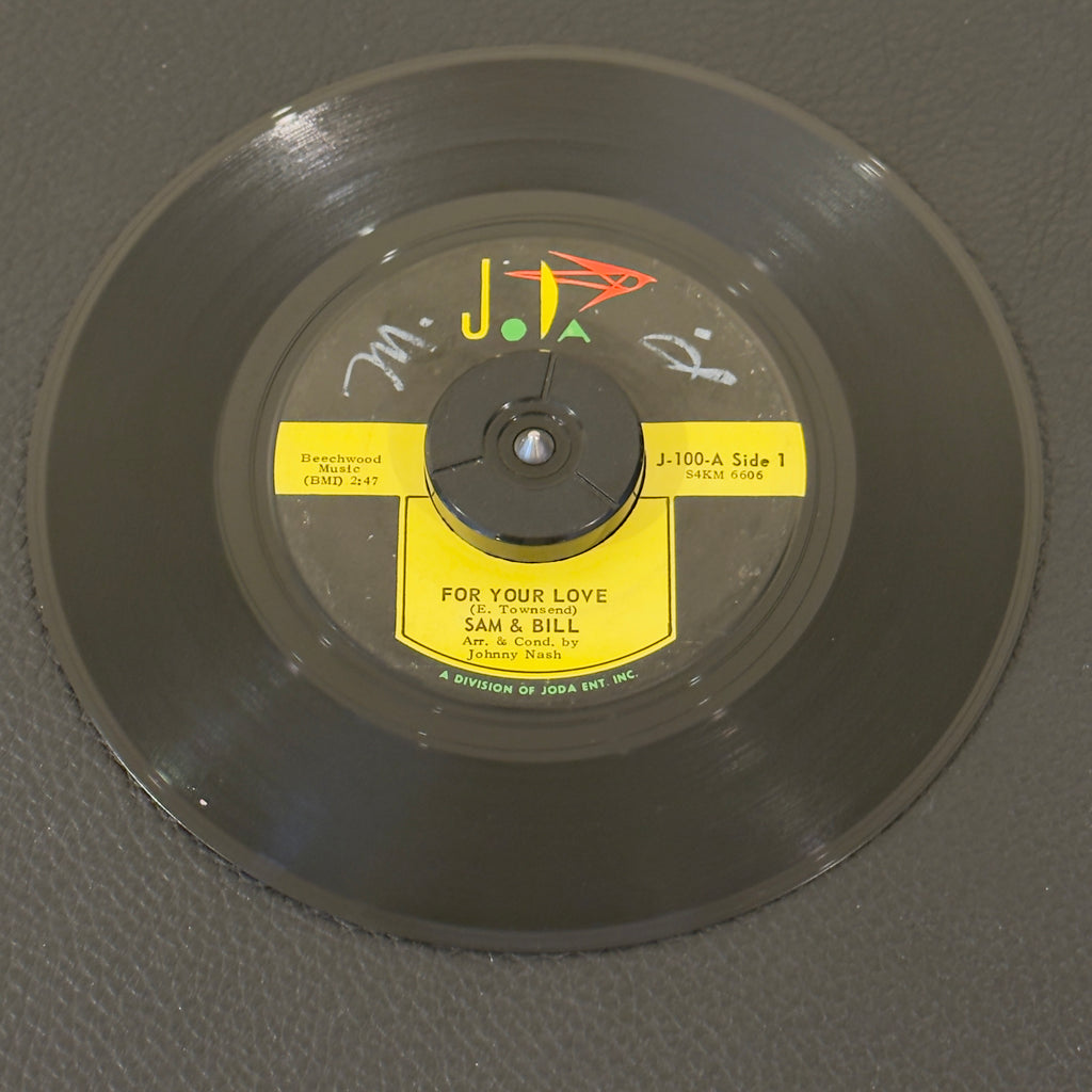 7" vinyl record by Sam & Bill featuring "For Your Love/Beautiful Baby", released on JoDa (J-100), in VG (Very Good) condition, classic analog collectable for turntable playback. Rockaway Pressing - writing on both sides of labels.