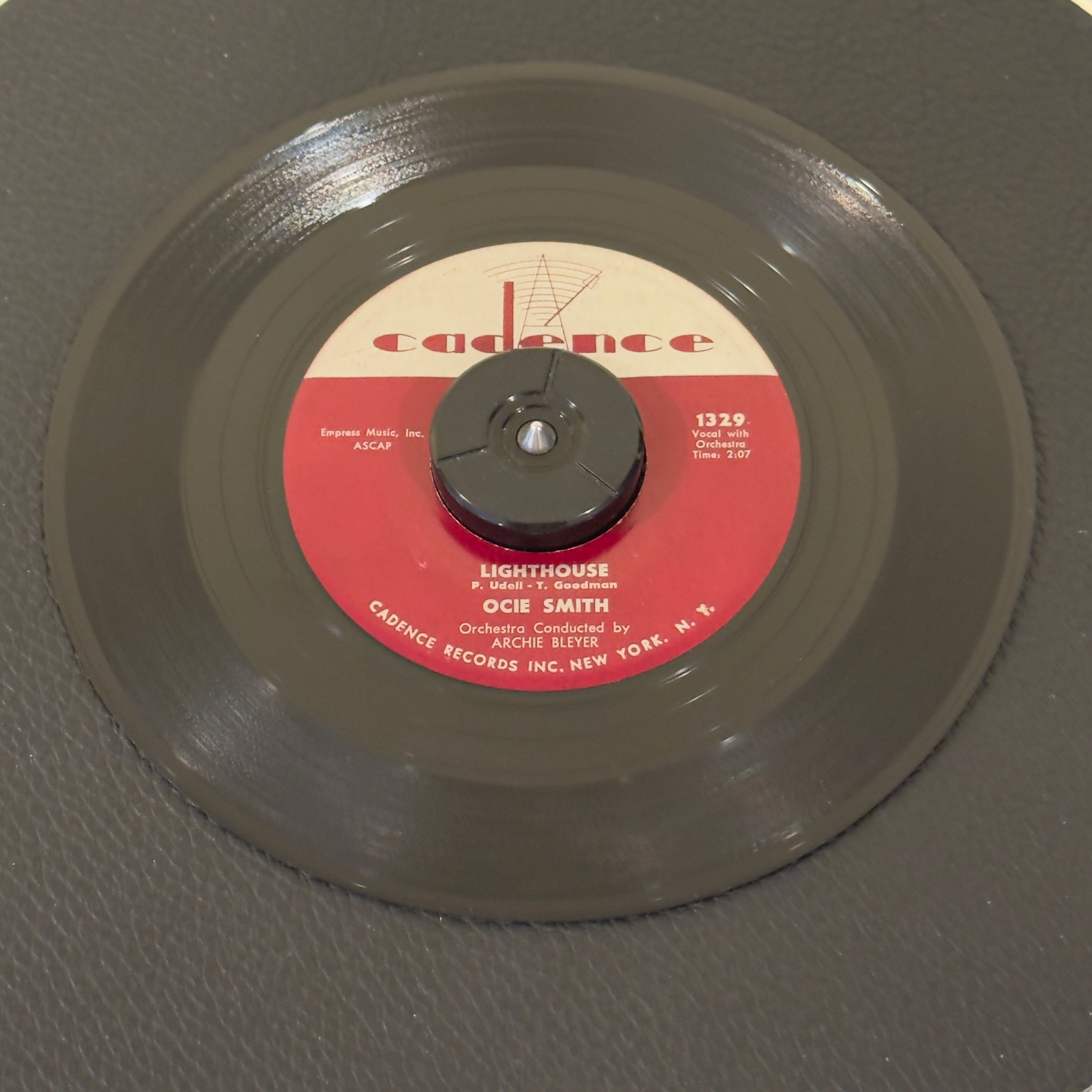7" vinyl record by Ocie Smith featuring "Lighthouse/Too Many", released on Cadence (1329), in VG+ (Very Good Plus) condition, classic analog collectable for turntable playback. Title Variation (Side A - Lighthouse)