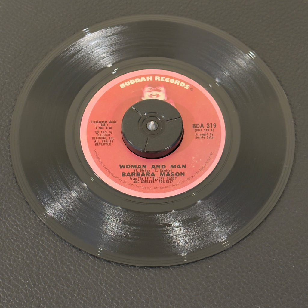 7" vinyl record by Barbara Mason featuring "Woman And Man/Who Will Hurt You Next", released on Buddah Records (BDA 319), in VG+ (Very Good Plus) condition, classic analog collectable for turntable playback. Includes Buddah sleeve.