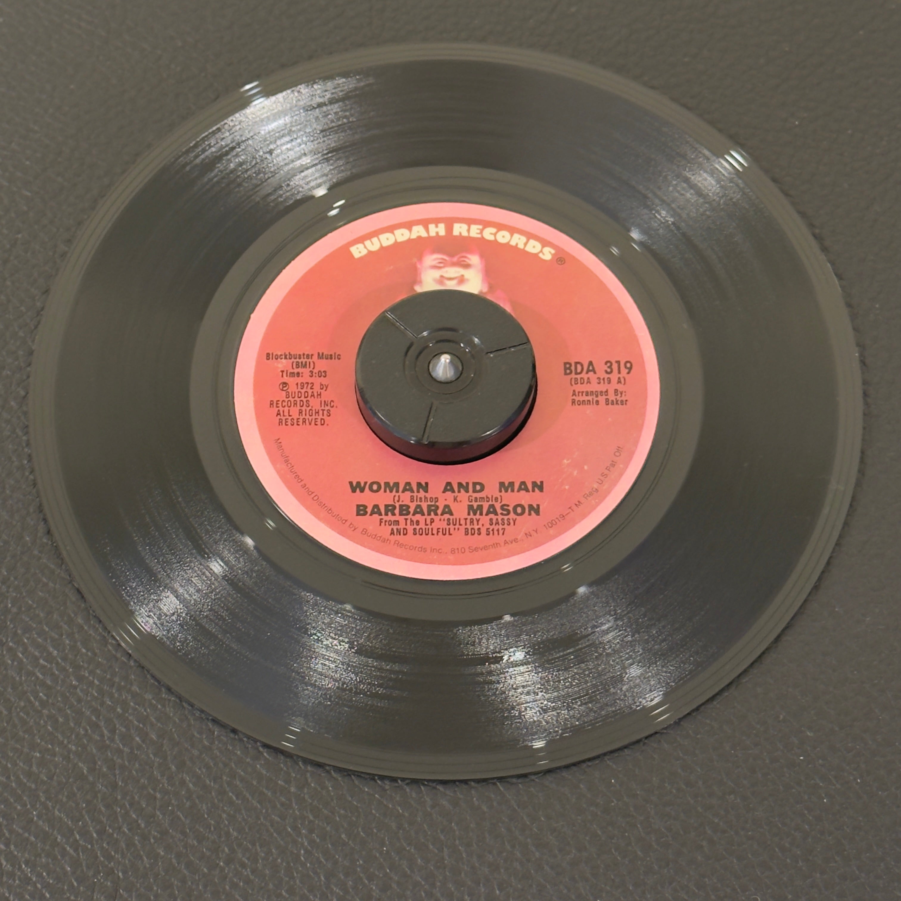 7" vinyl record by Barbara Mason featuring "Woman And Man/Who Will Hurt You Next", released on Buddah Records (BDA 319), in VG+ (Very Good Plus) condition, classic analog collectable for turntable playback. Includes Buddah sleeve.