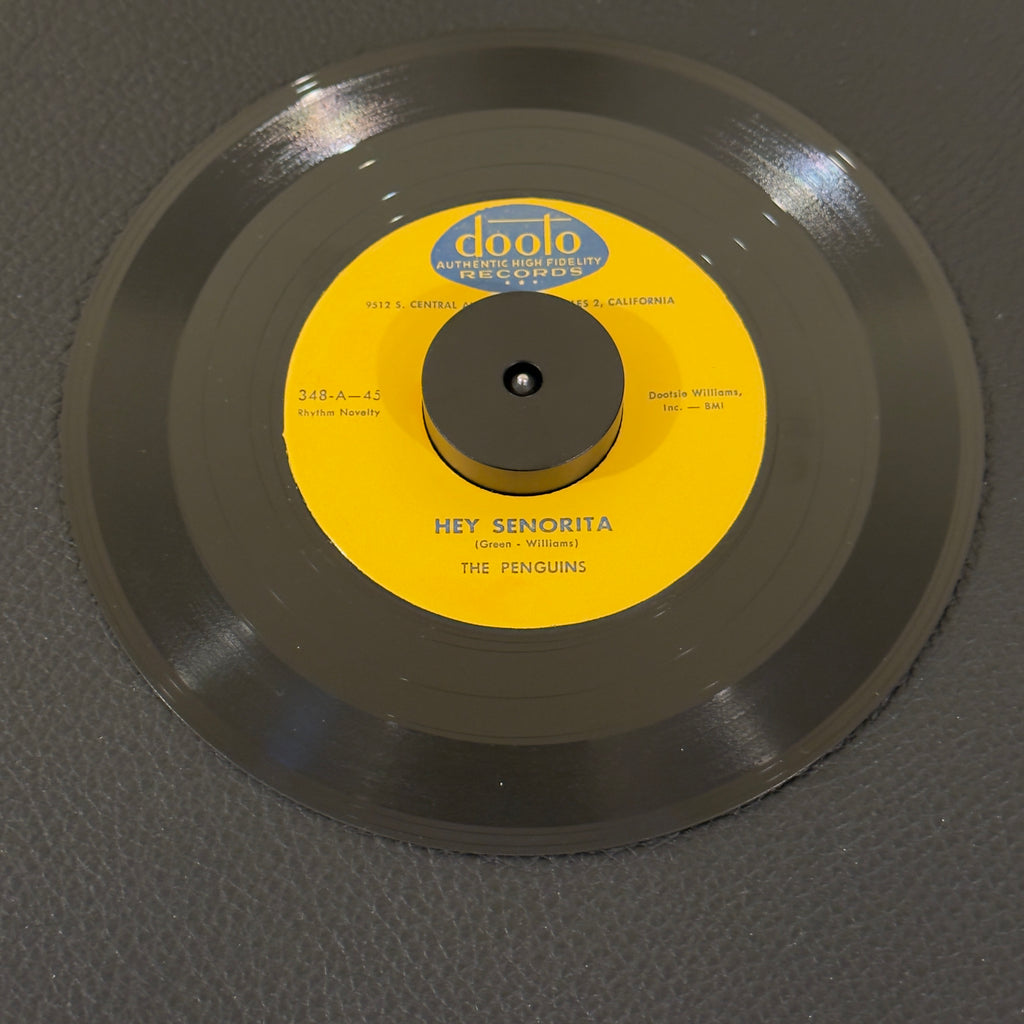 7" vinyl record by Penguins, The featuring "Hey Senorita/Earth Angel", released on Dooto Records (348), in VG+ (Very Good Plus) condition, classic analog collectable for turntable playback. Reissue