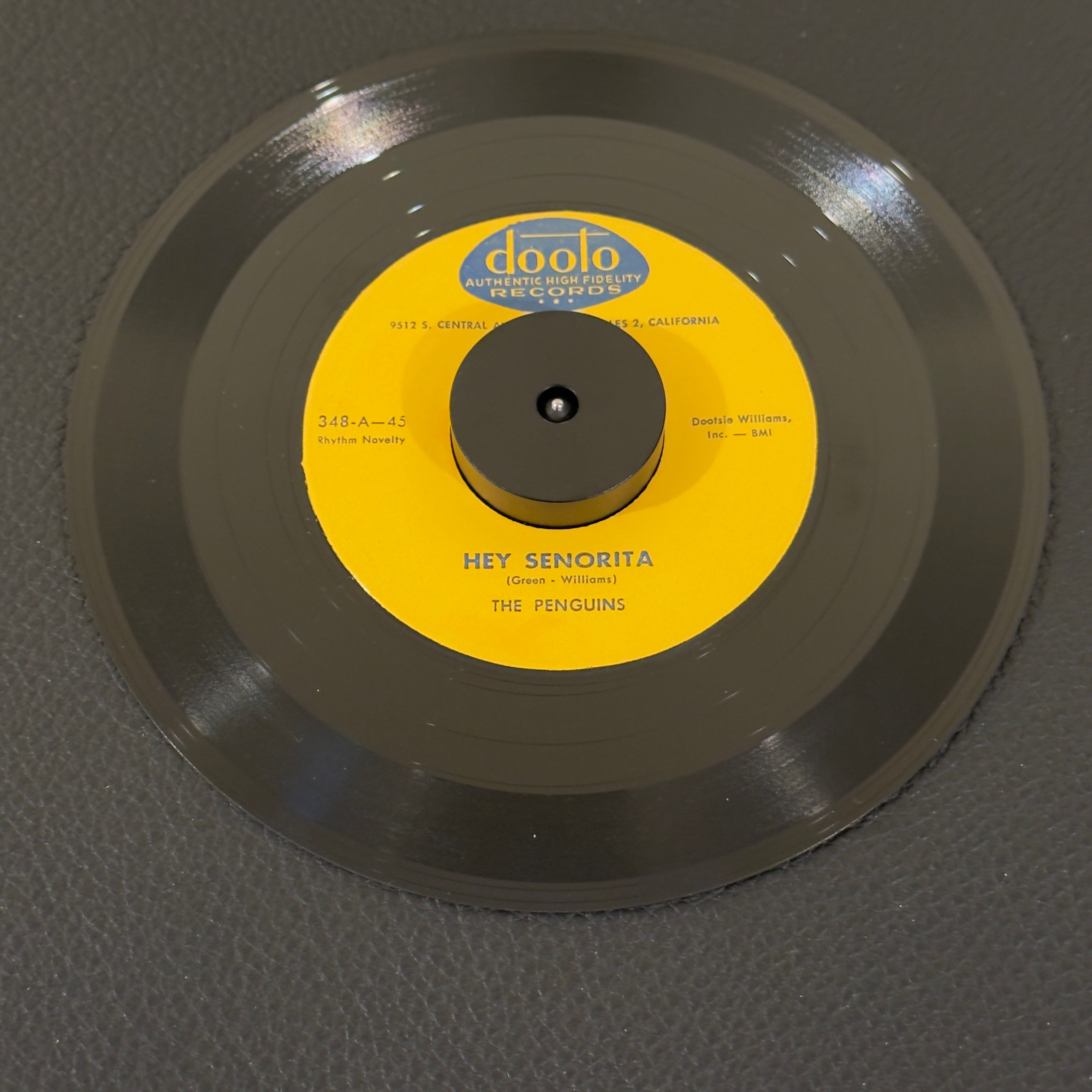 7" vinyl record by Penguins, The featuring "Hey Senorita/Earth Angel", released on Dooto Records (348), in VG+ (Very Good Plus) condition, classic analog collectable for turntable playback. Reissue